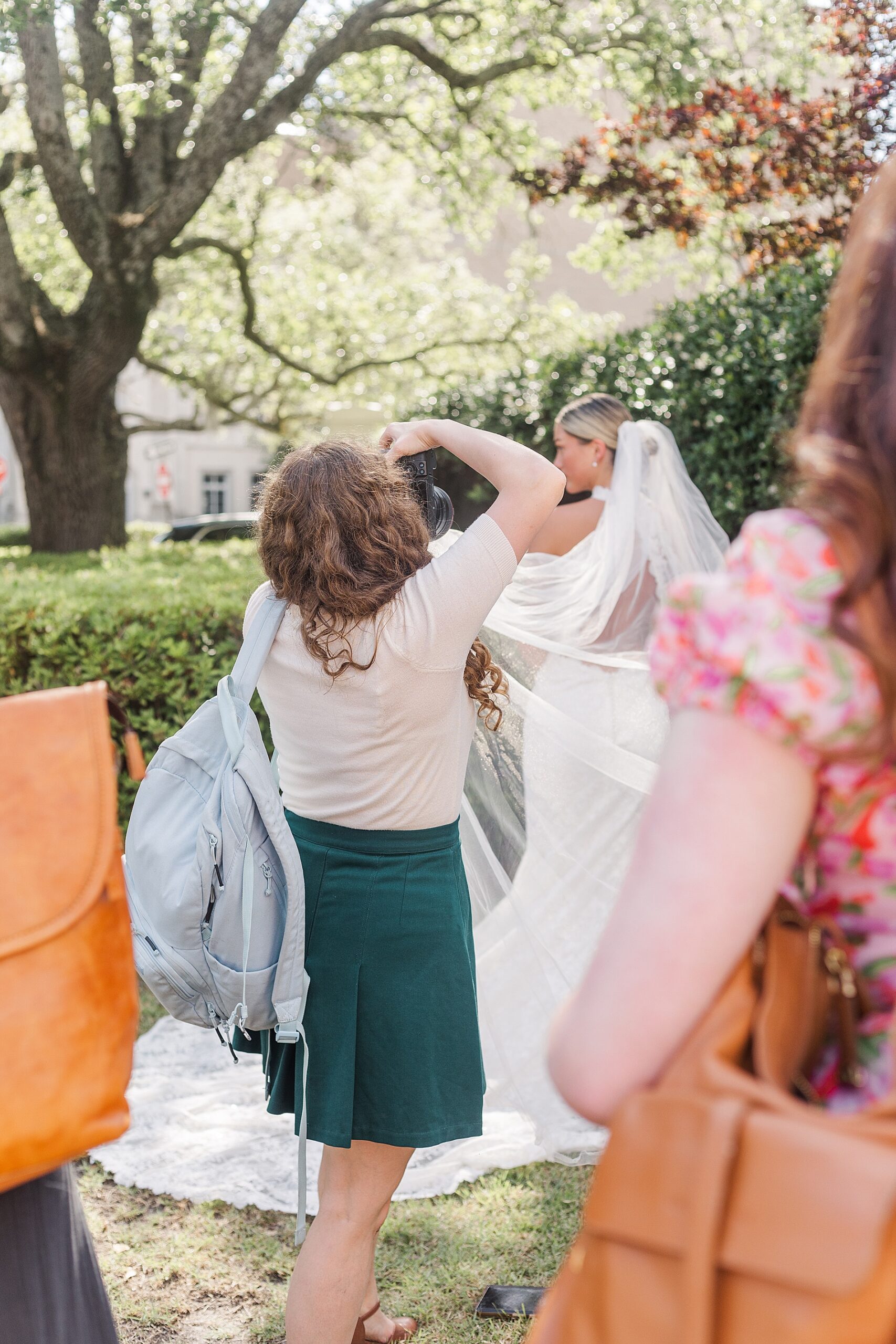photographers take photos of bride