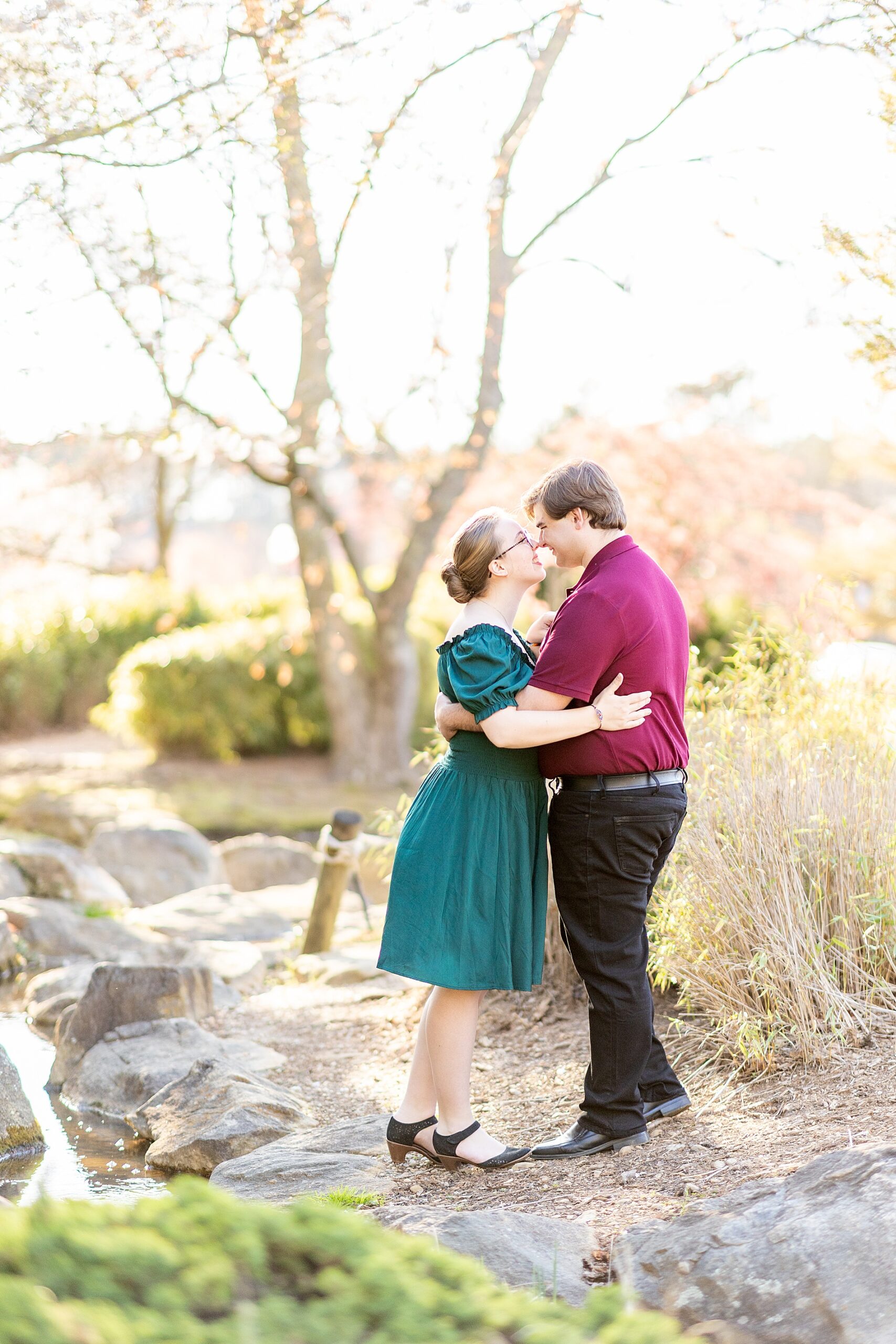 couple hug during spring engagement
