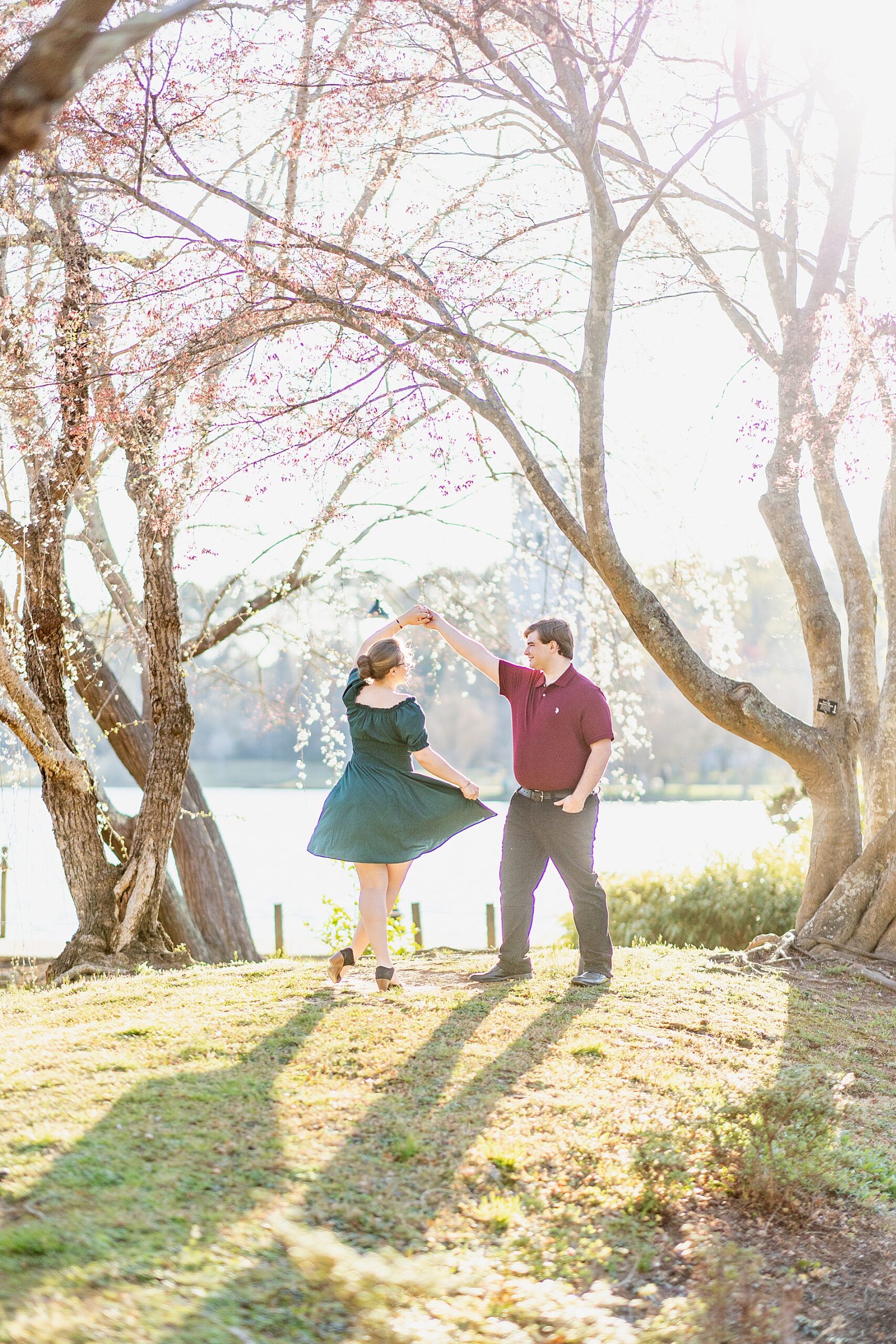 guy twirls his fiancé