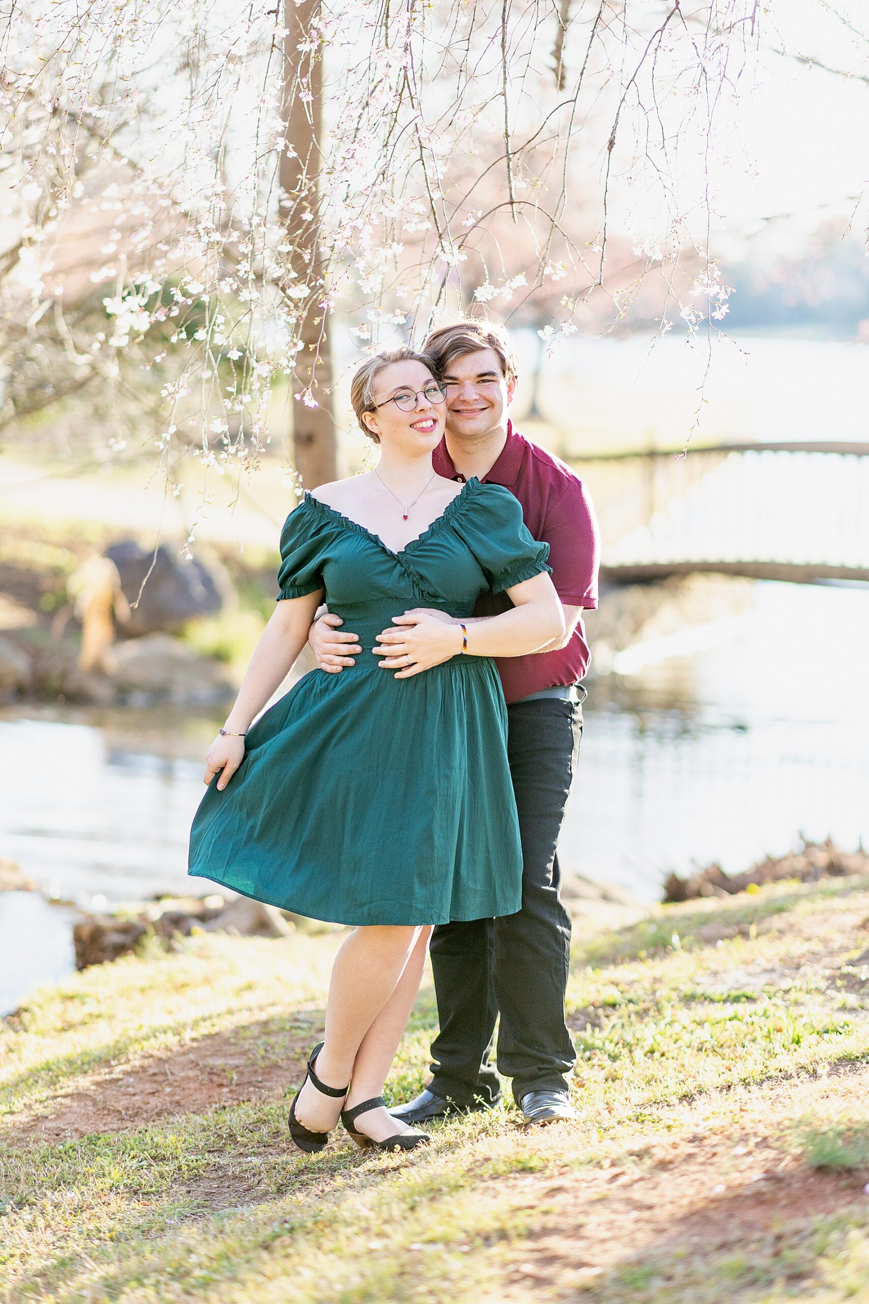 couple under blooming tree