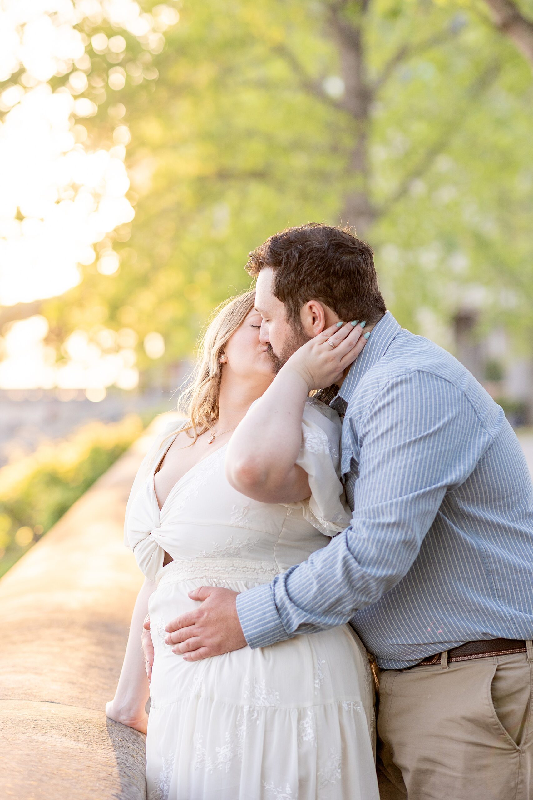 woman kisses fiancé