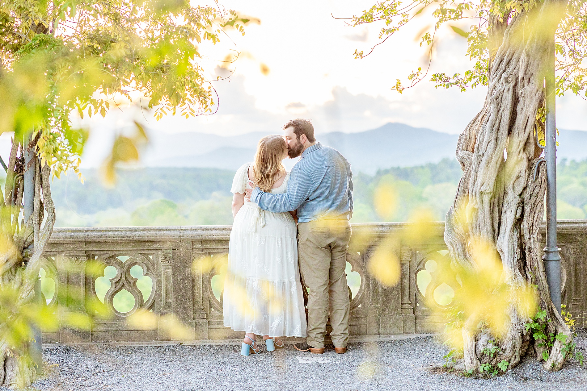 couple kiss at Biltmore Estate in Asheville, NC