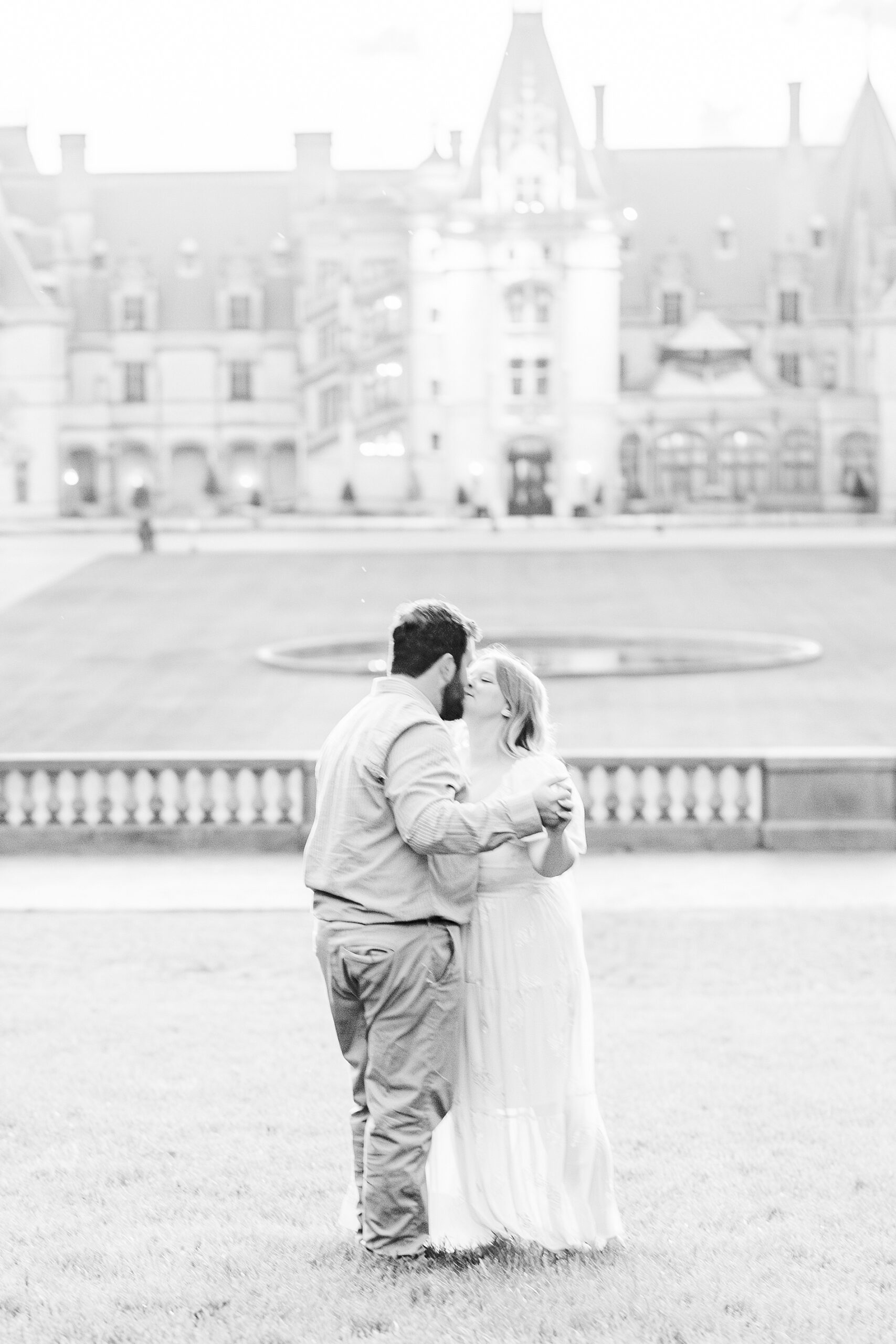engaged couple kiss during Asheville, NC engagement