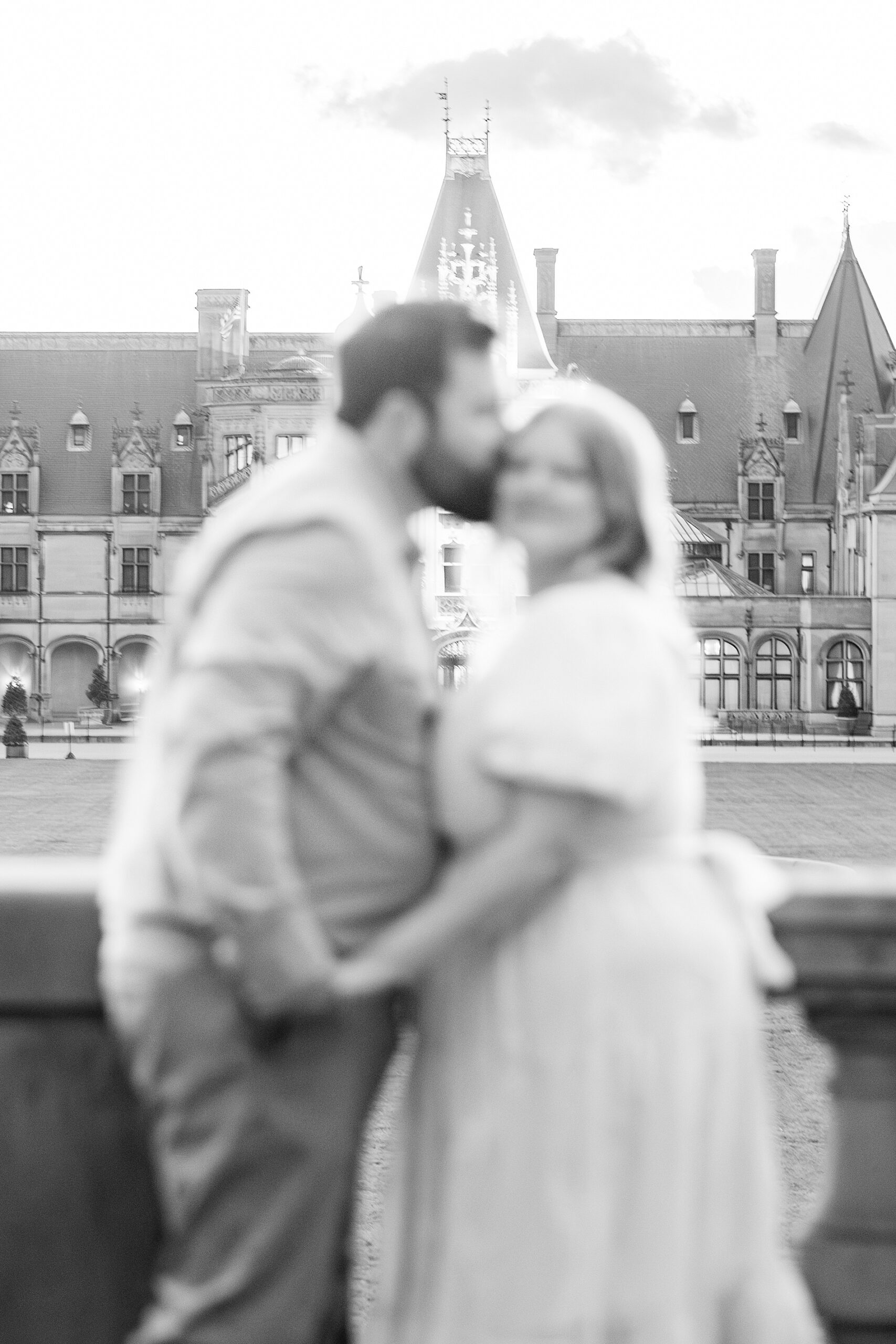 guy kisses his fiancé