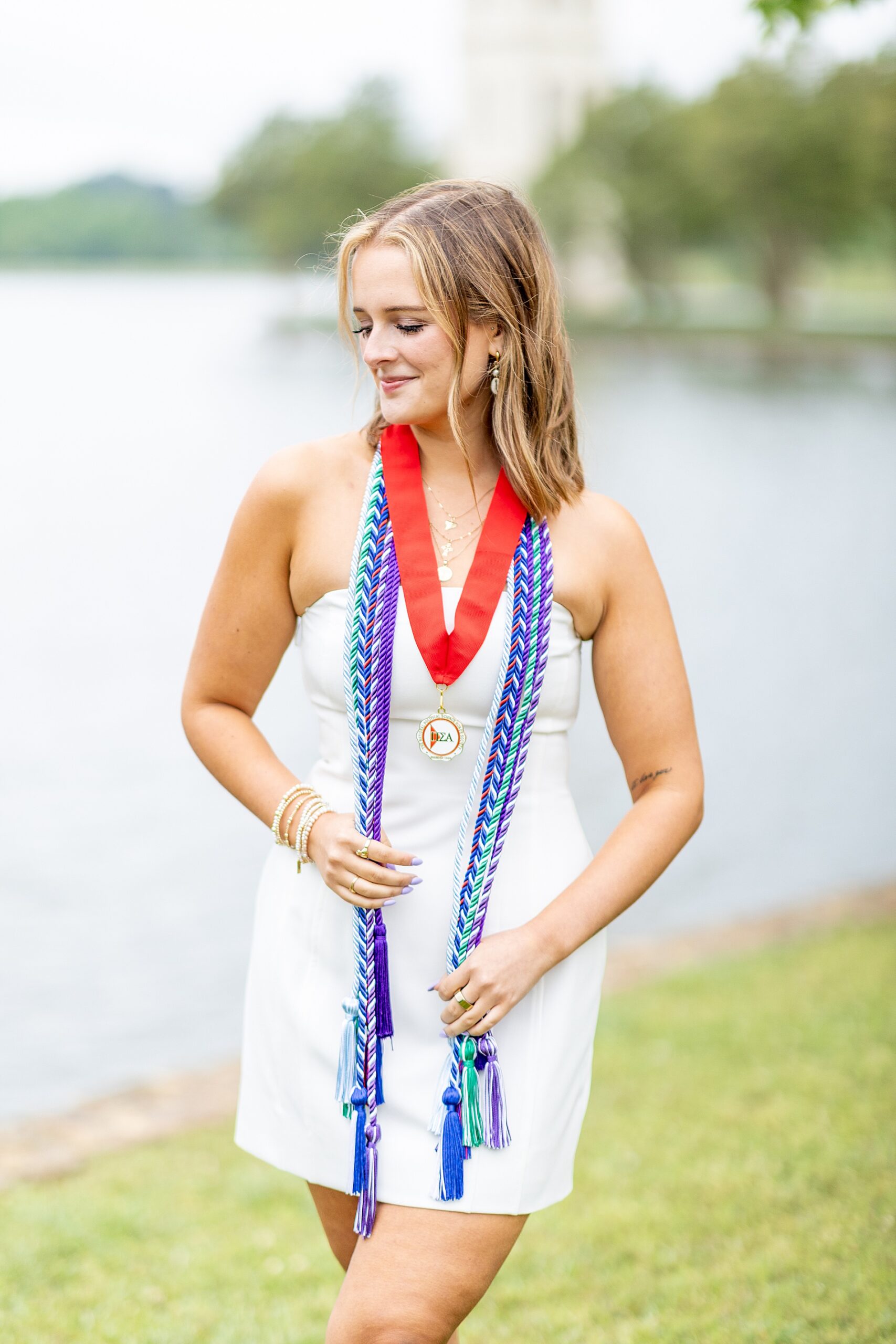 college graduate wears all her cords from university