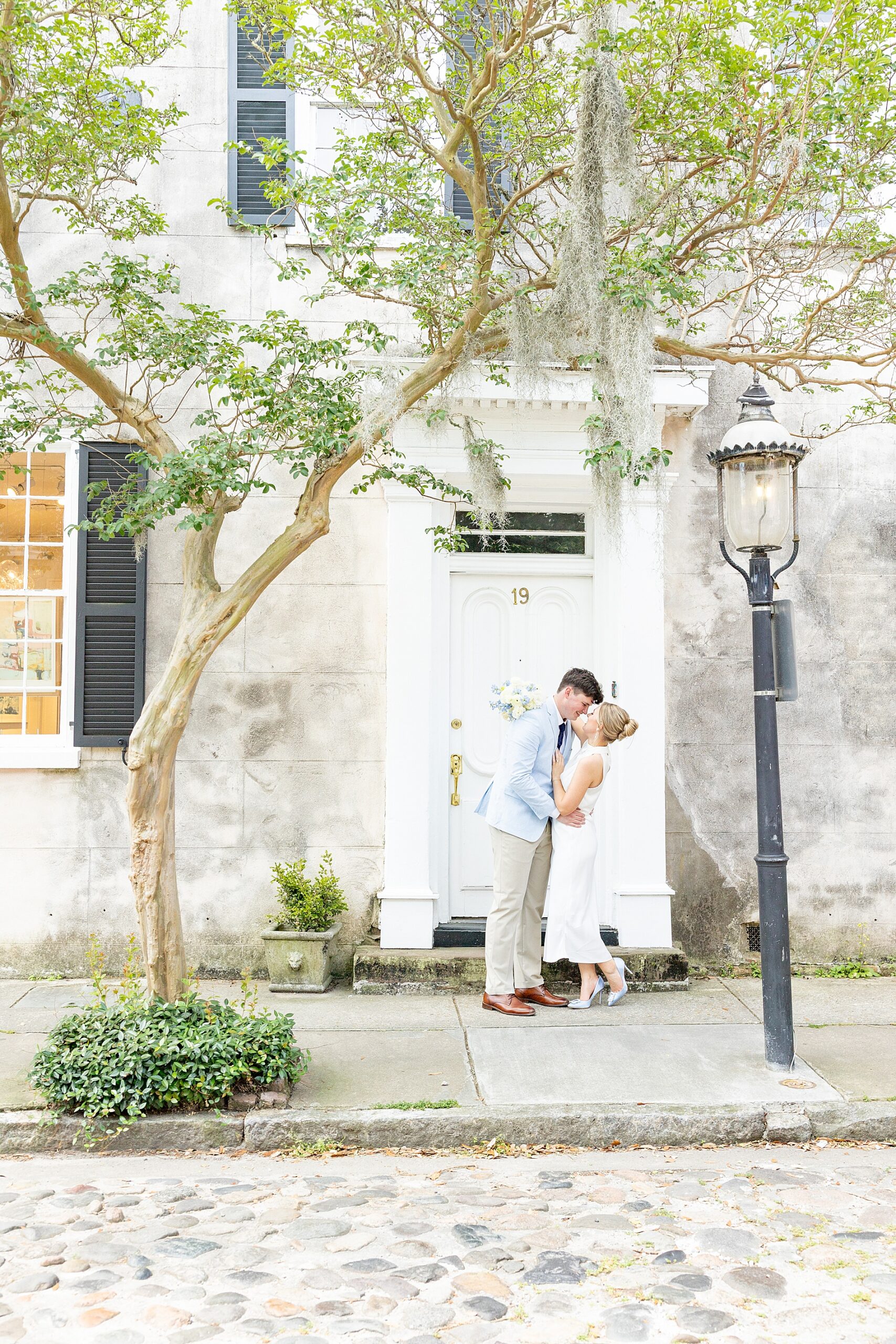 Timeless Charleston engagement photos of couple kissing
