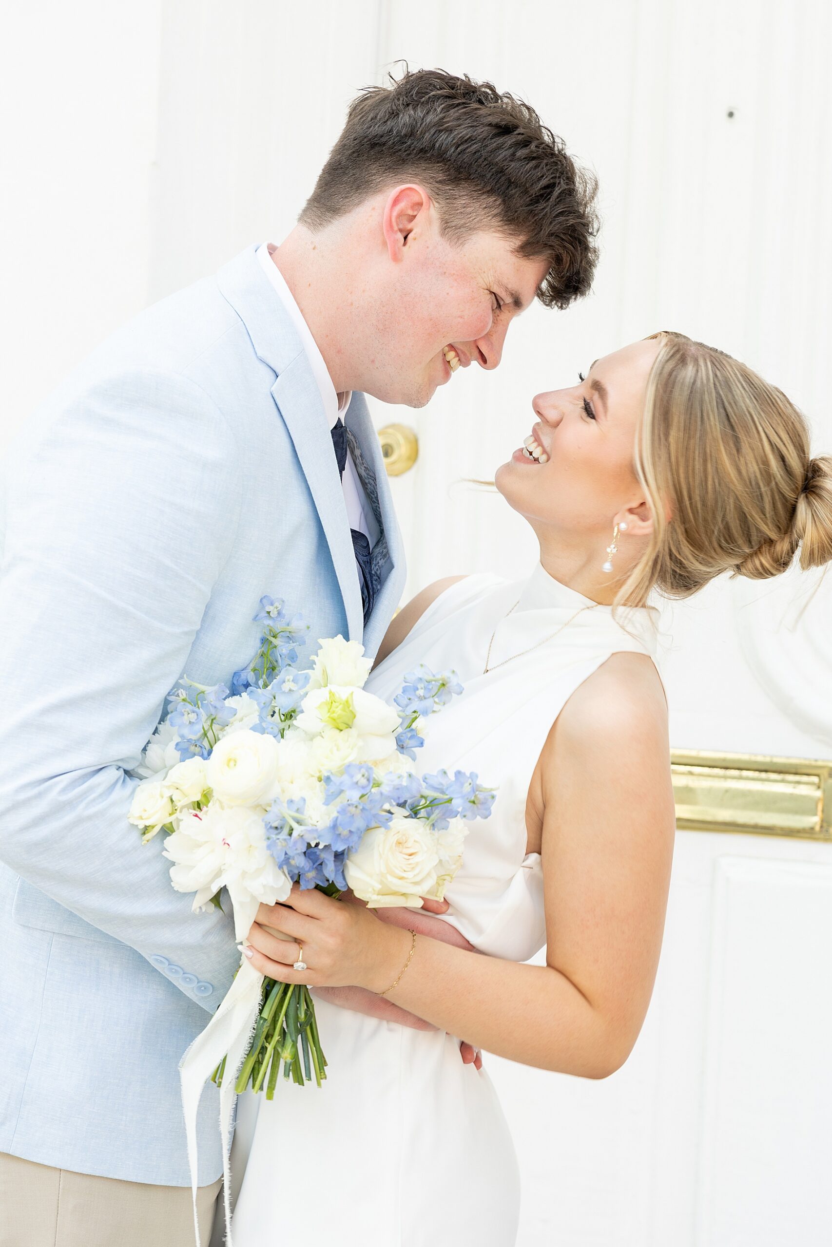 engaged couple look up at each other