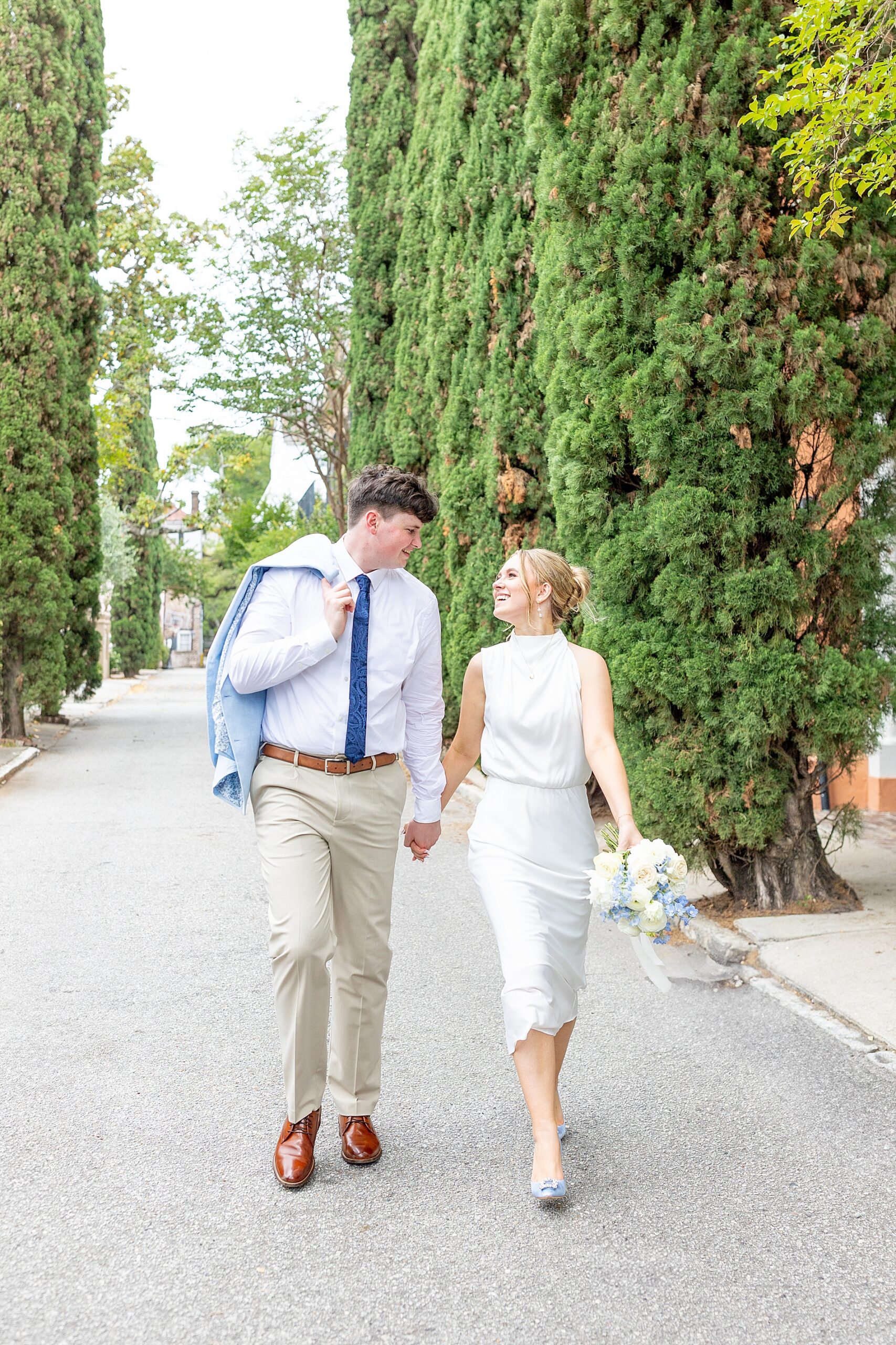couple walk together holding hands