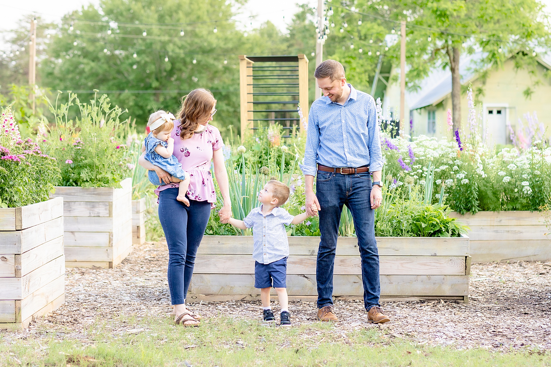 parents walk with their two kids