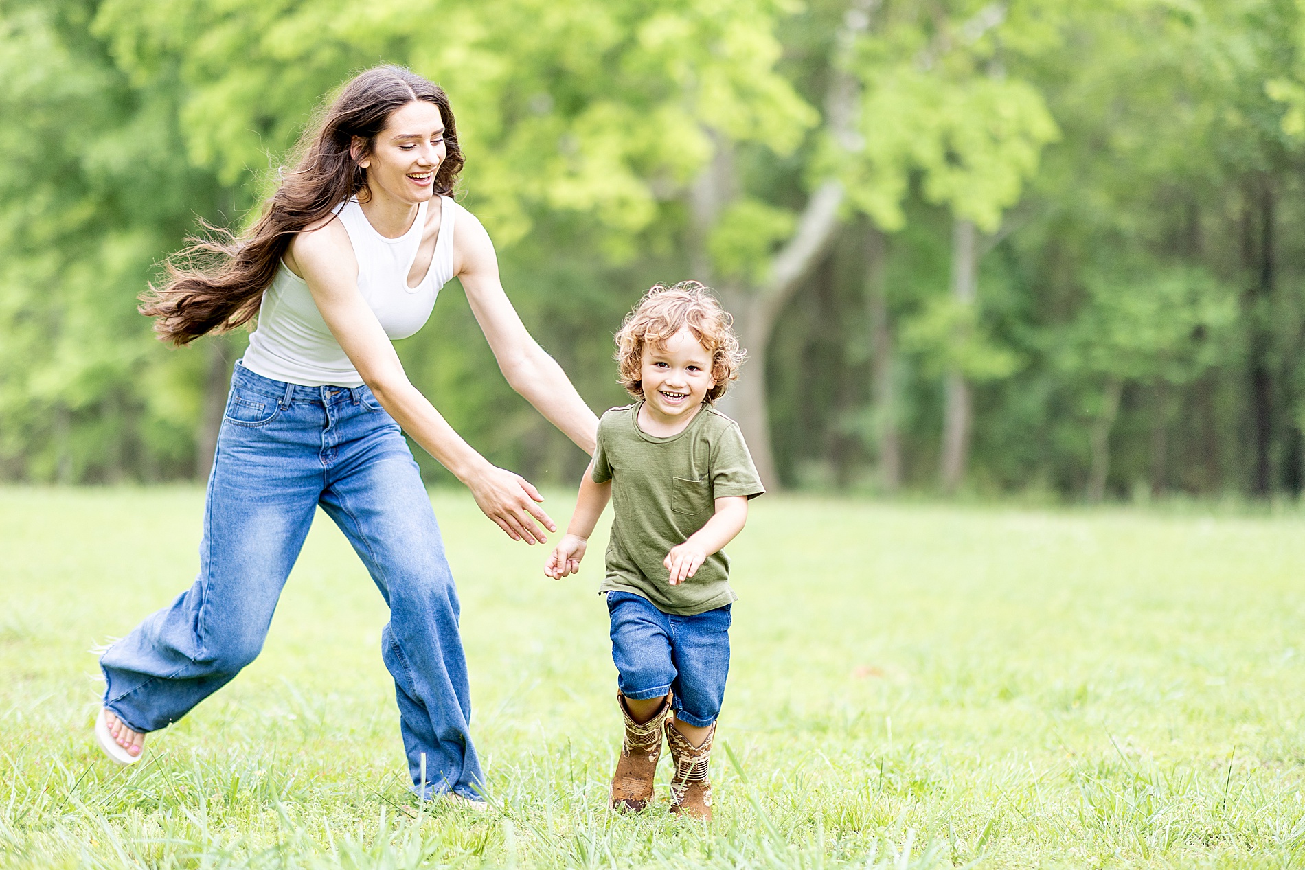 candid family photos of mom chasing son