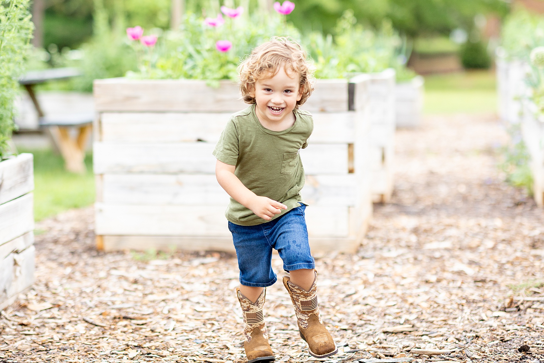little boy runs and plays during spring mini sessions