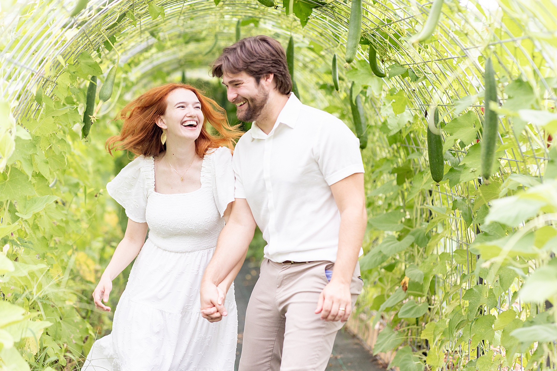 candid couple photos of husband and wife walking and laughing together