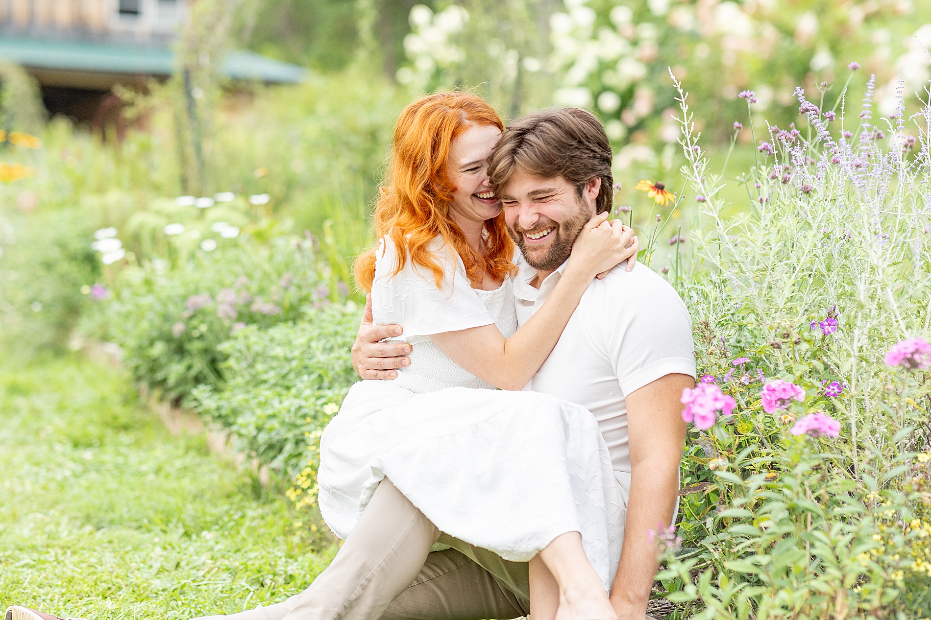 couple laughs together during Anniversary Session at The Never Ending Flower Farm | Asheville, NC Wedding Photographer 