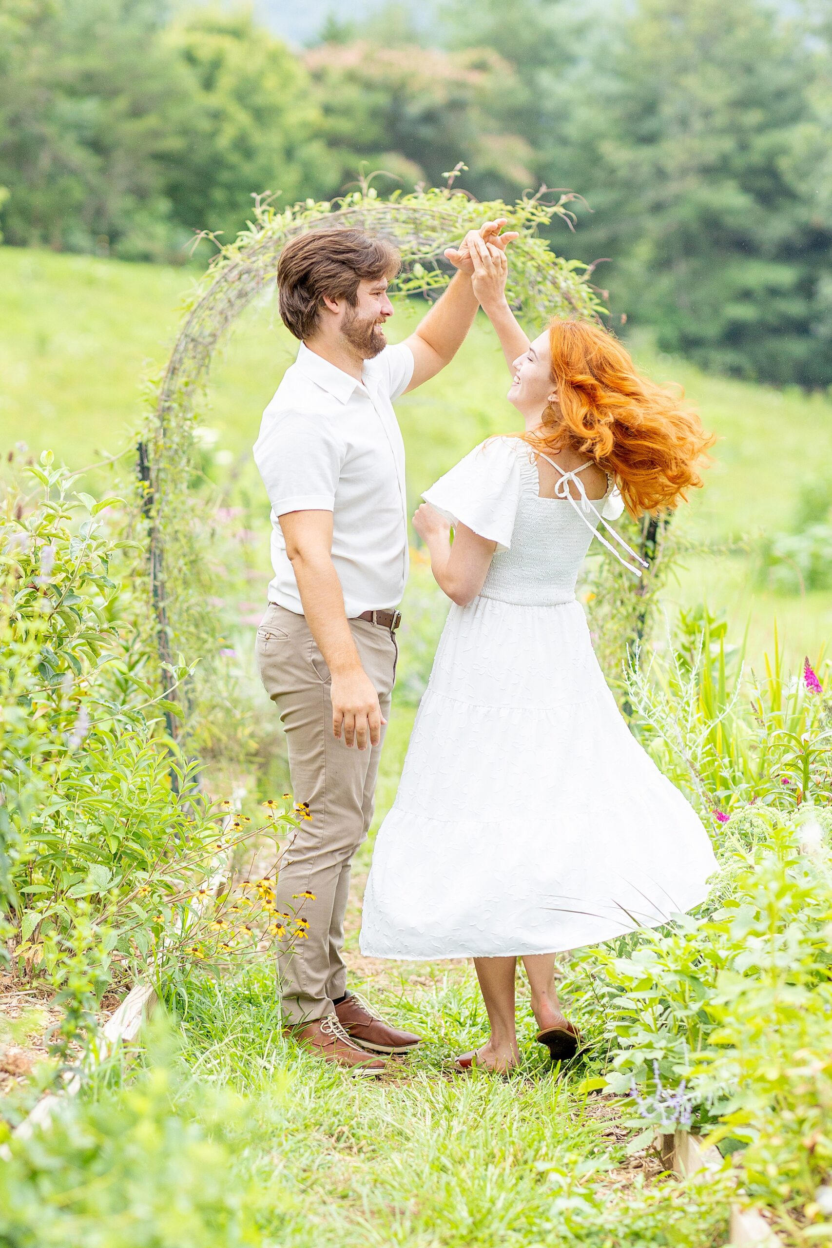 couple dances together during anniversary session