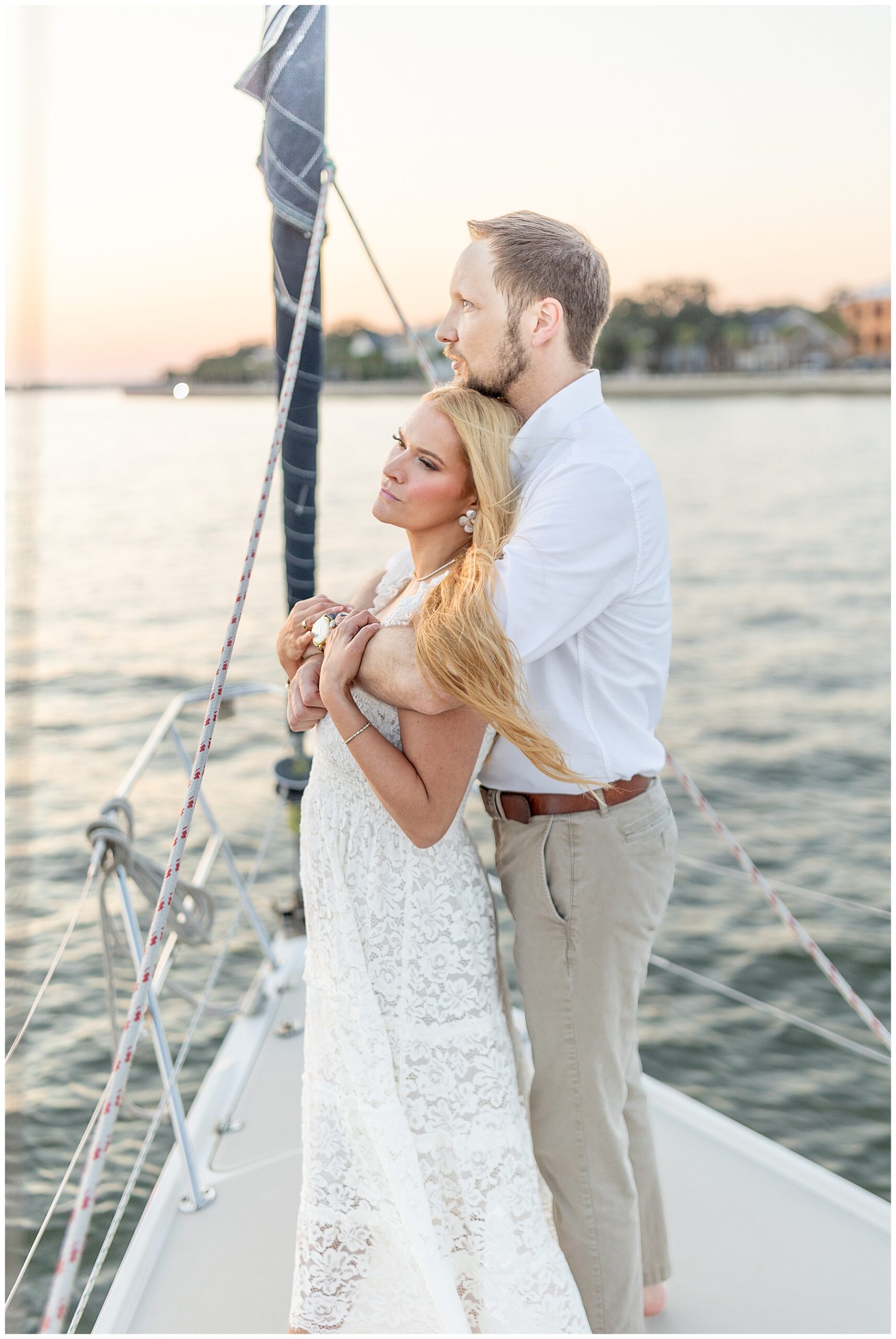 Charleston Harbor Wedding Portraits on a Sailboat by Charleston wedding photographer 