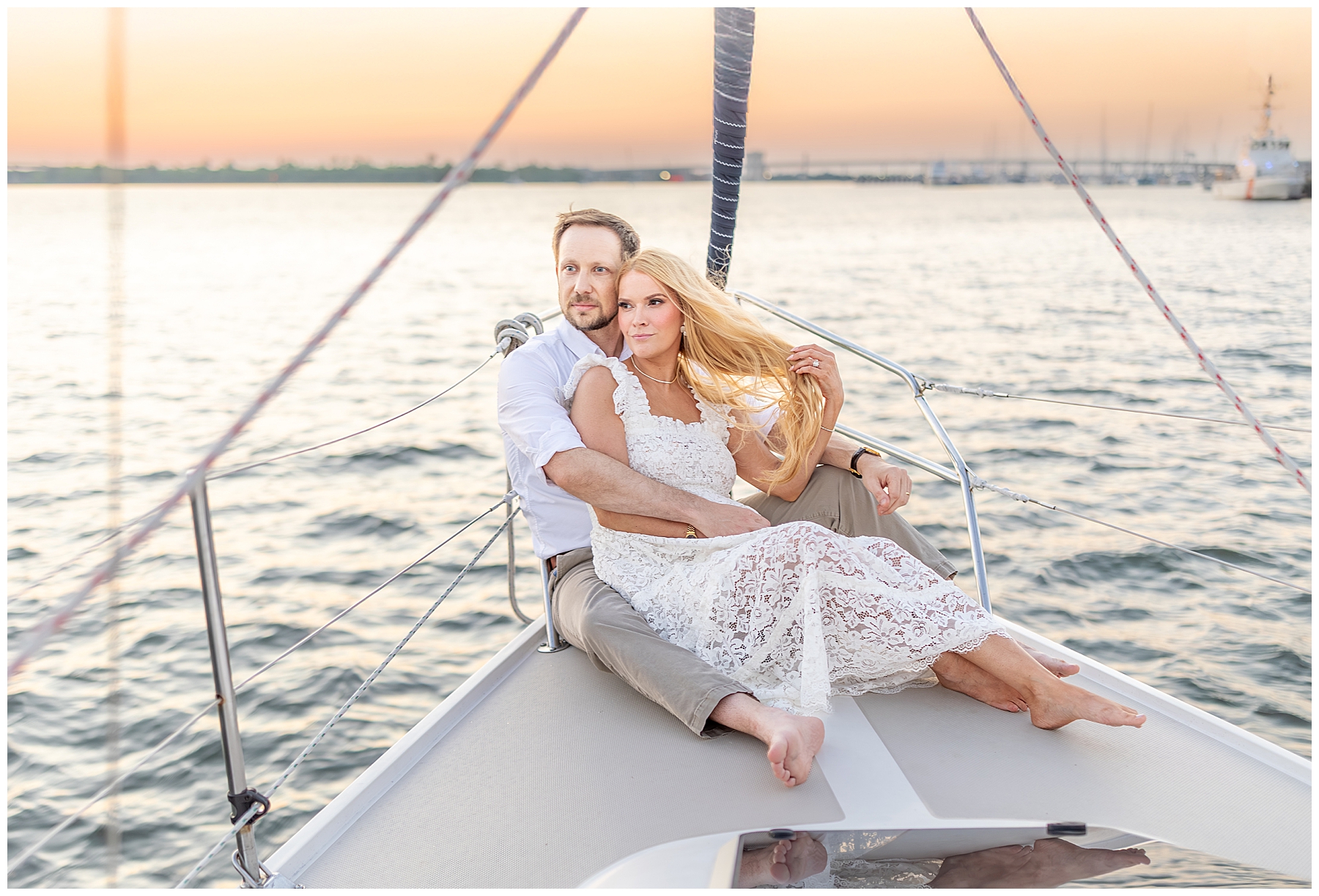 Charleston Harbor Wedding Portraits on a Sailboat by Charleston wedding photographer 