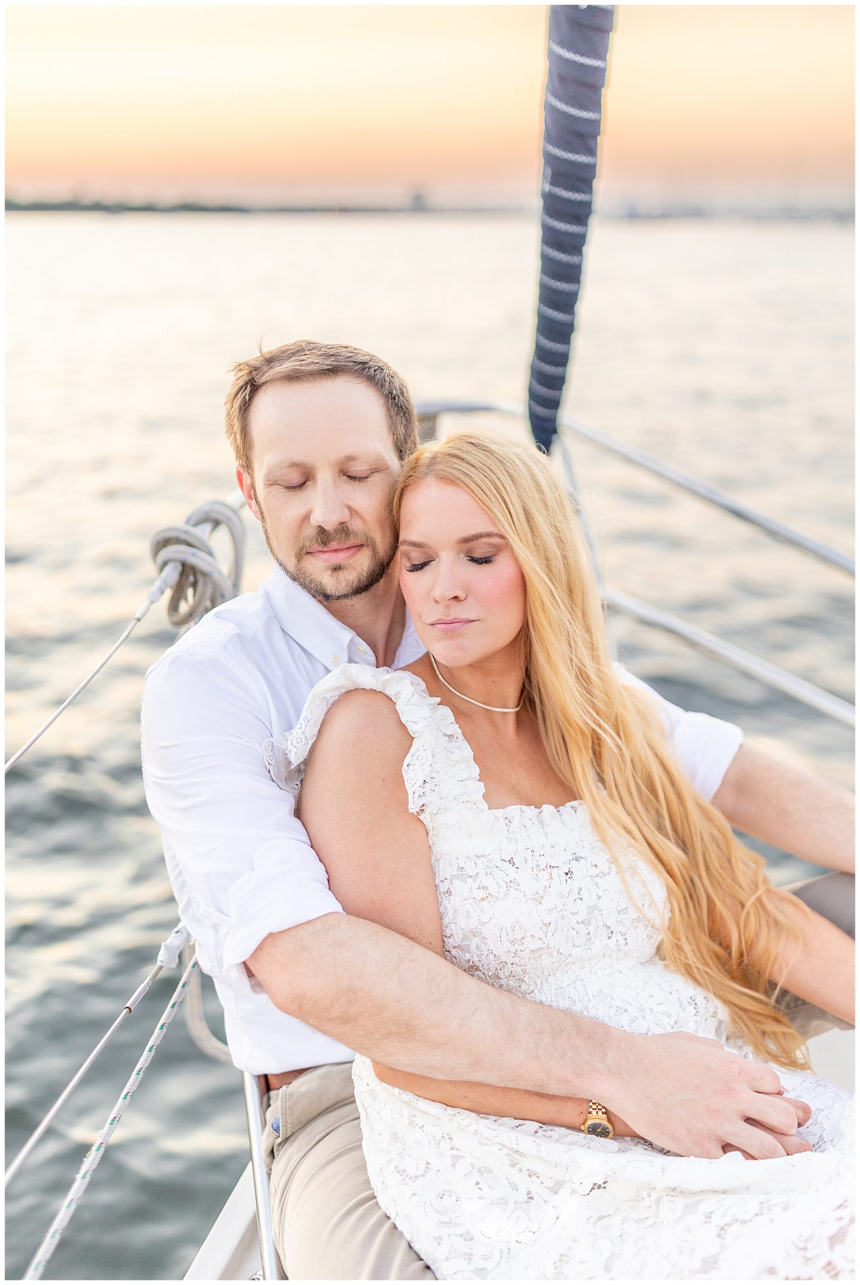 Charleston Harbor Wedding Portraits on a Sailboat by Charleston wedding photographer 