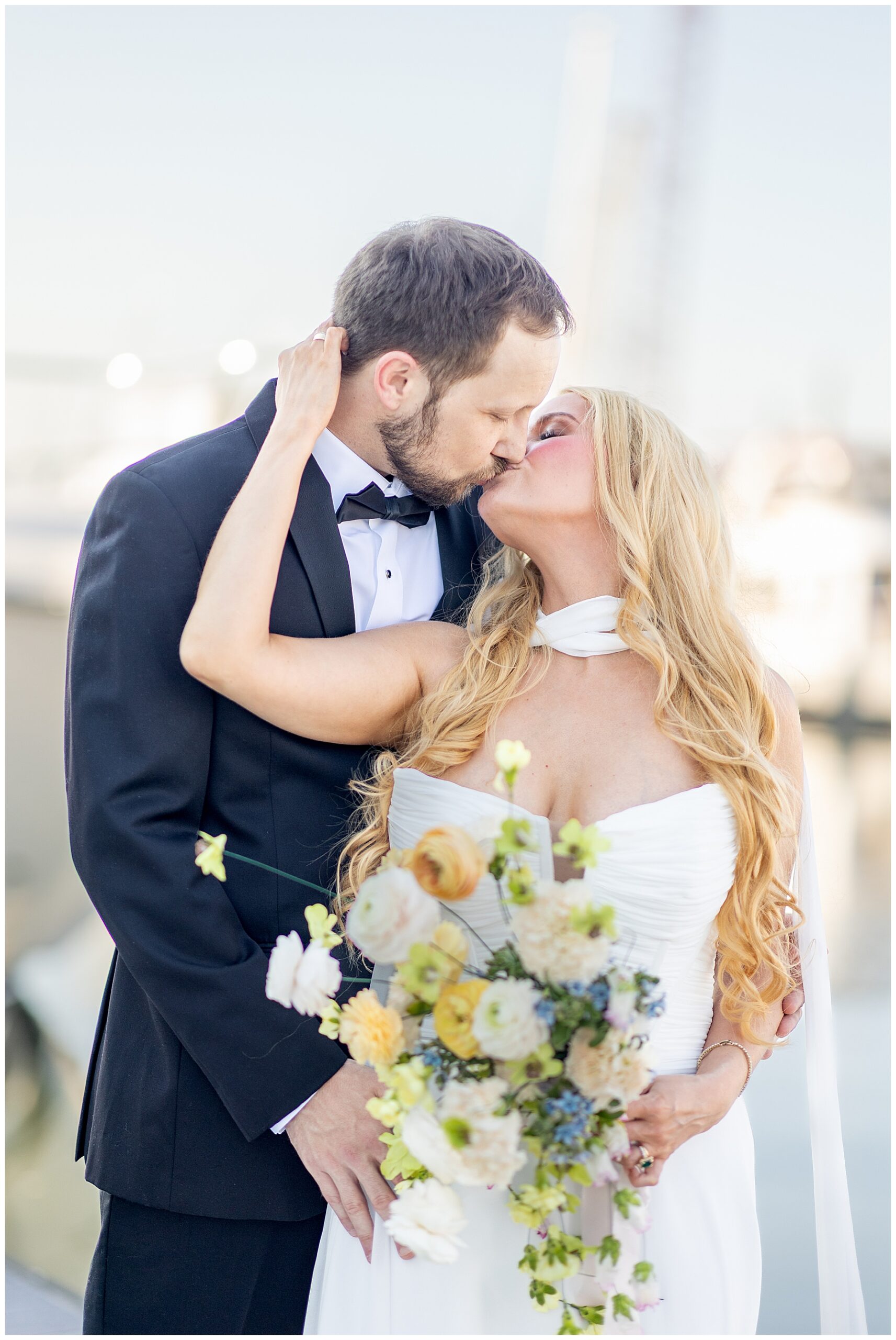 Charleston Harbor Wedding Portraits on a Sailboat by Charleston wedding photographer 