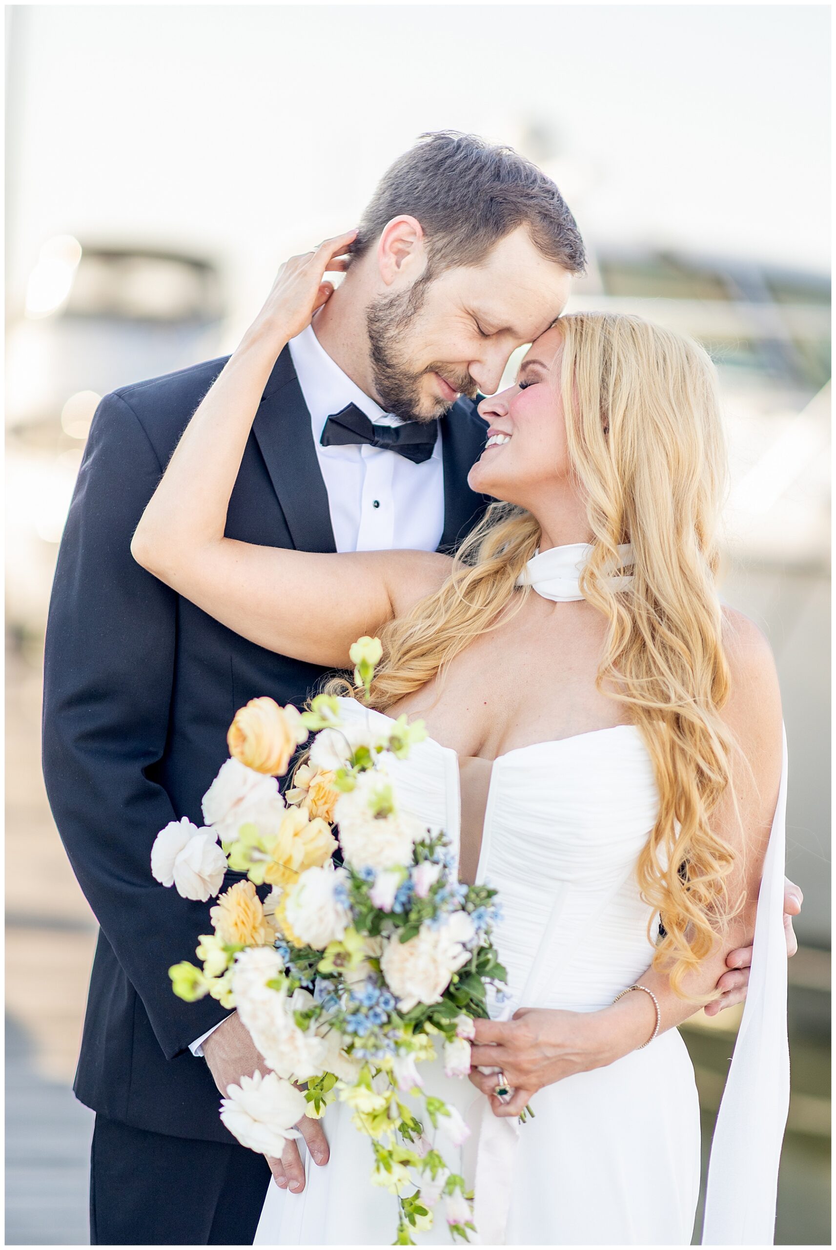 Charleston Harbor Wedding Portraits on a Sailboat by Charleston wedding photographer 