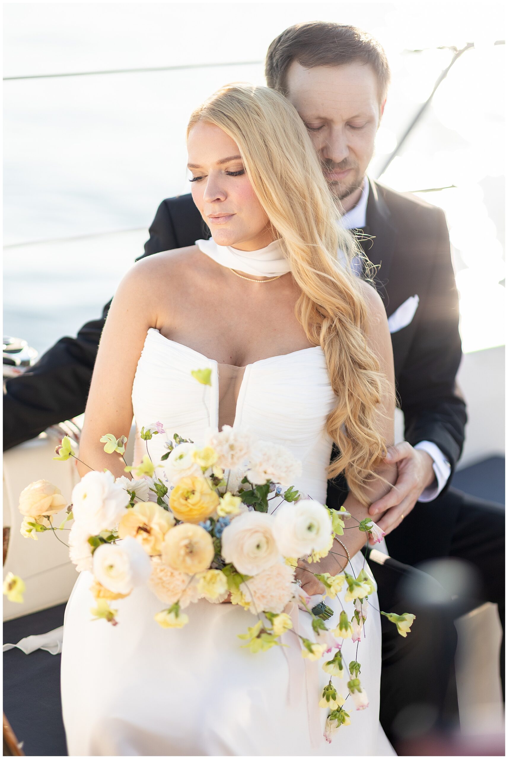 wedding portraits at Charleston Harbor on sailboat