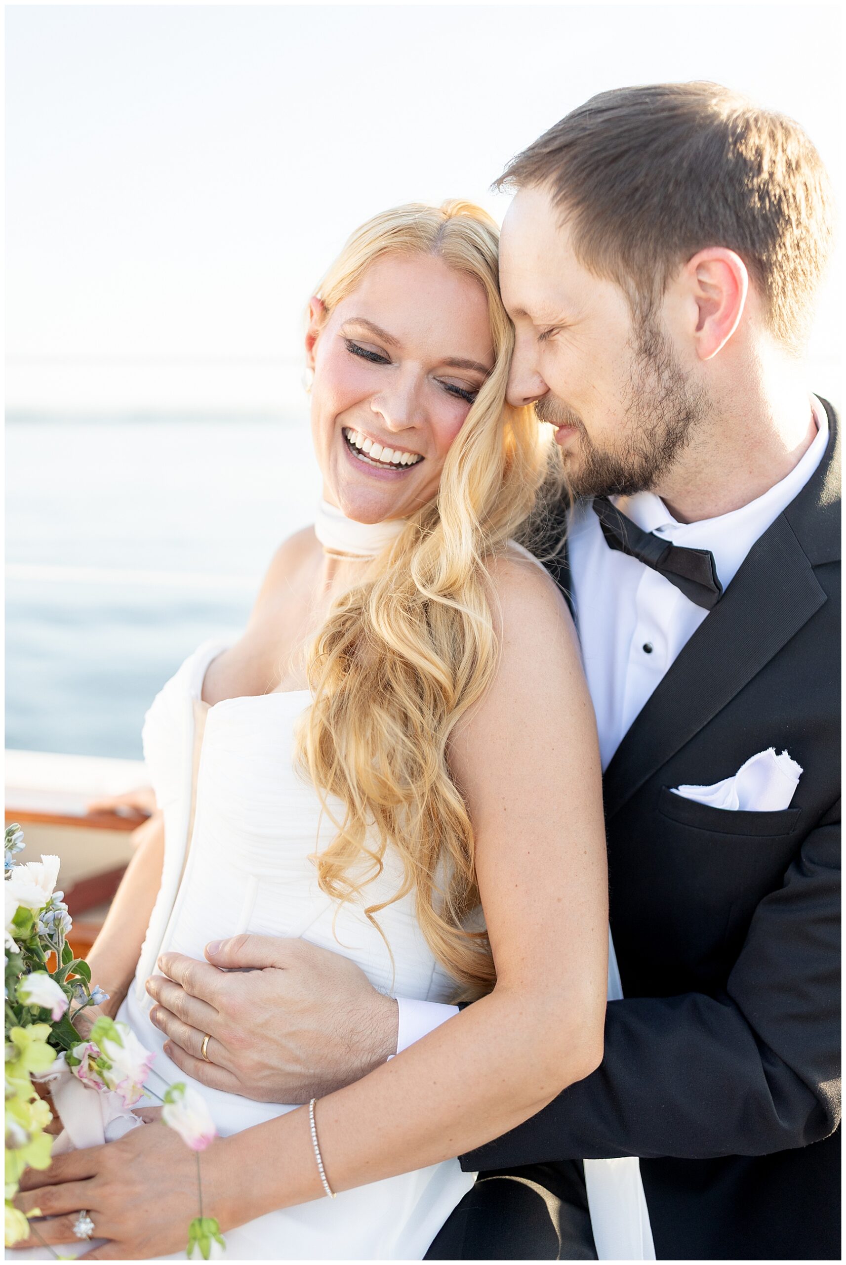 Charleston Harbor Wedding Portraits on a Sailboat by Charleston wedding photographer 