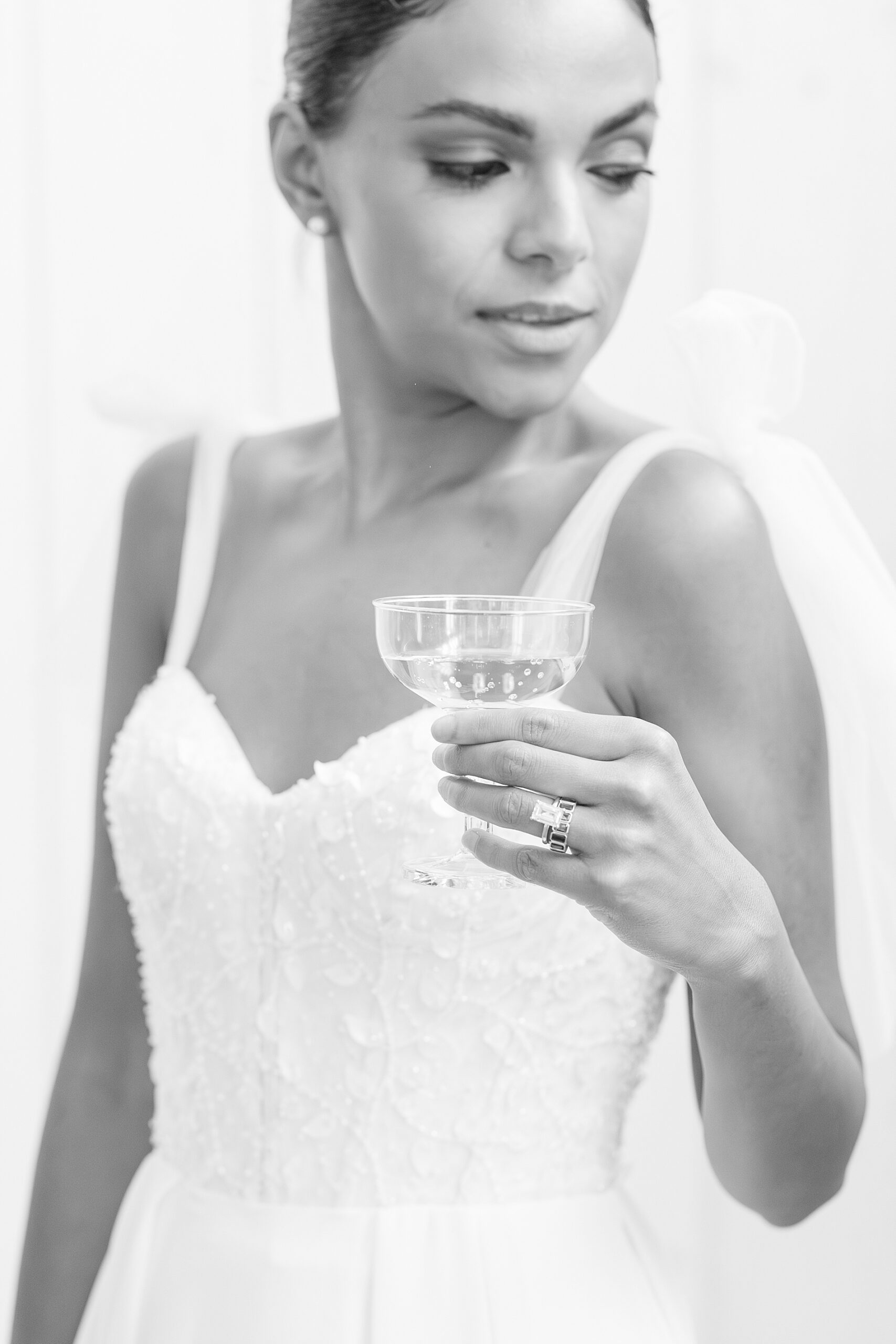 bride holding champagne