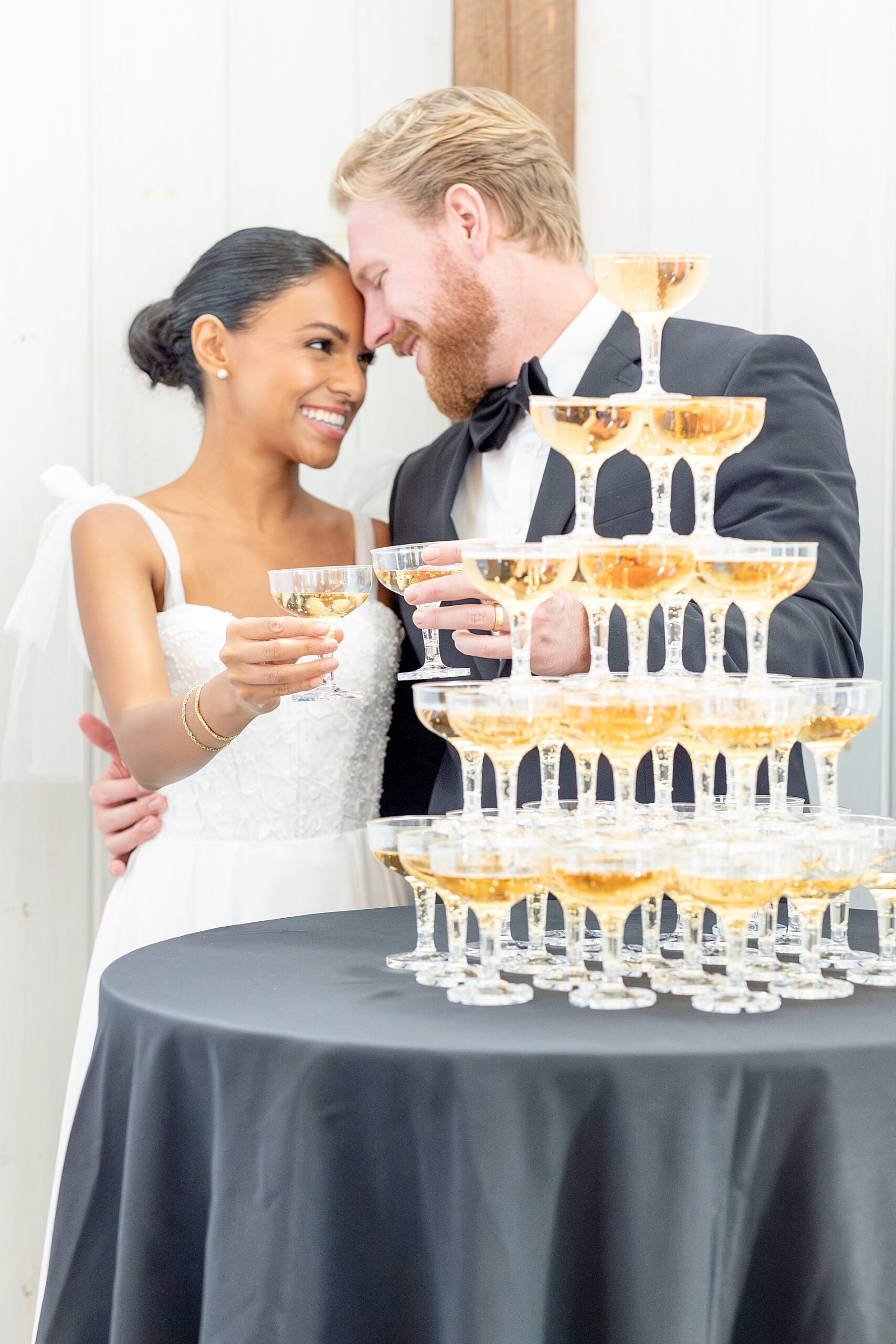 newlyweds toast with glass of champagne