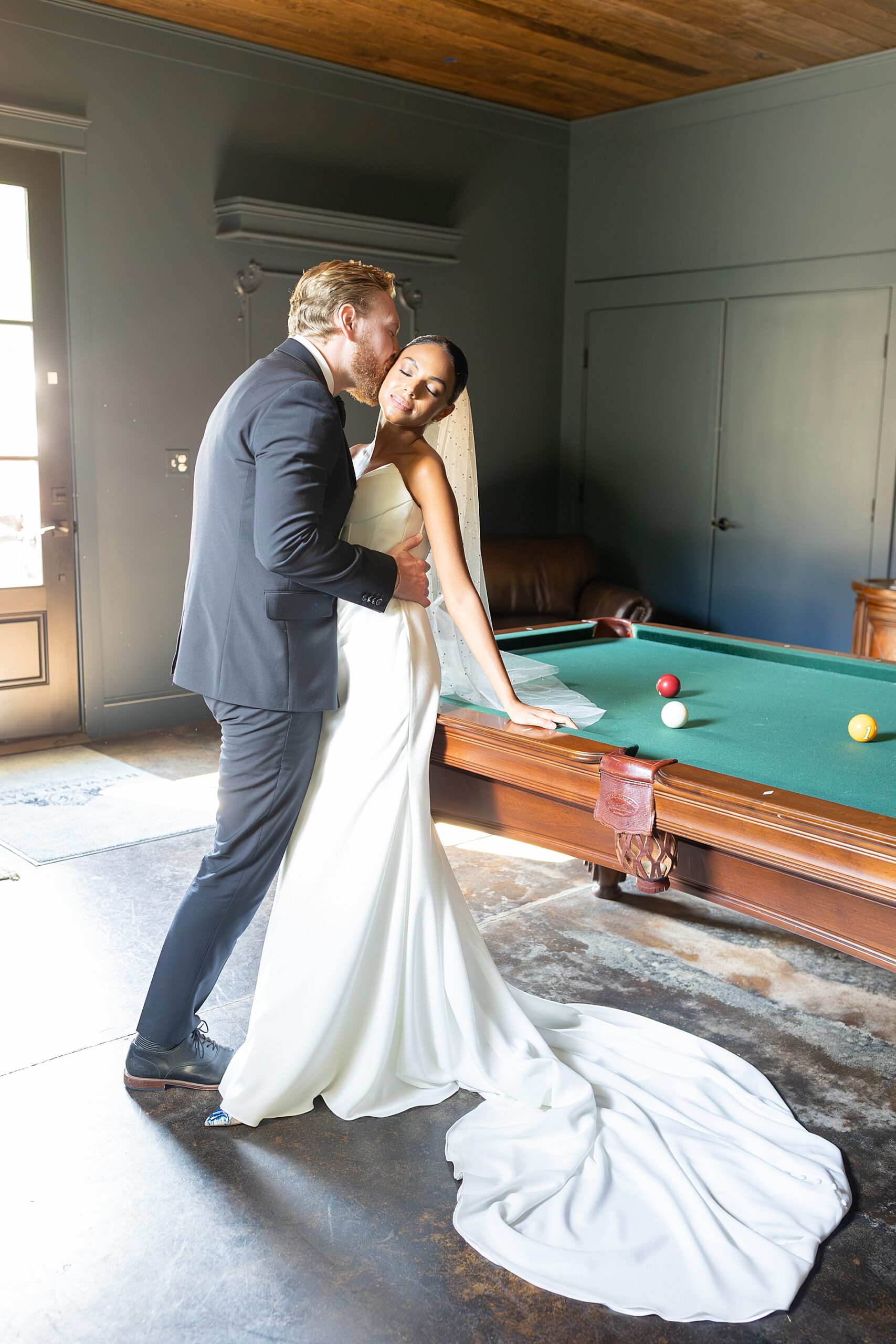 newlywed photos by pool table