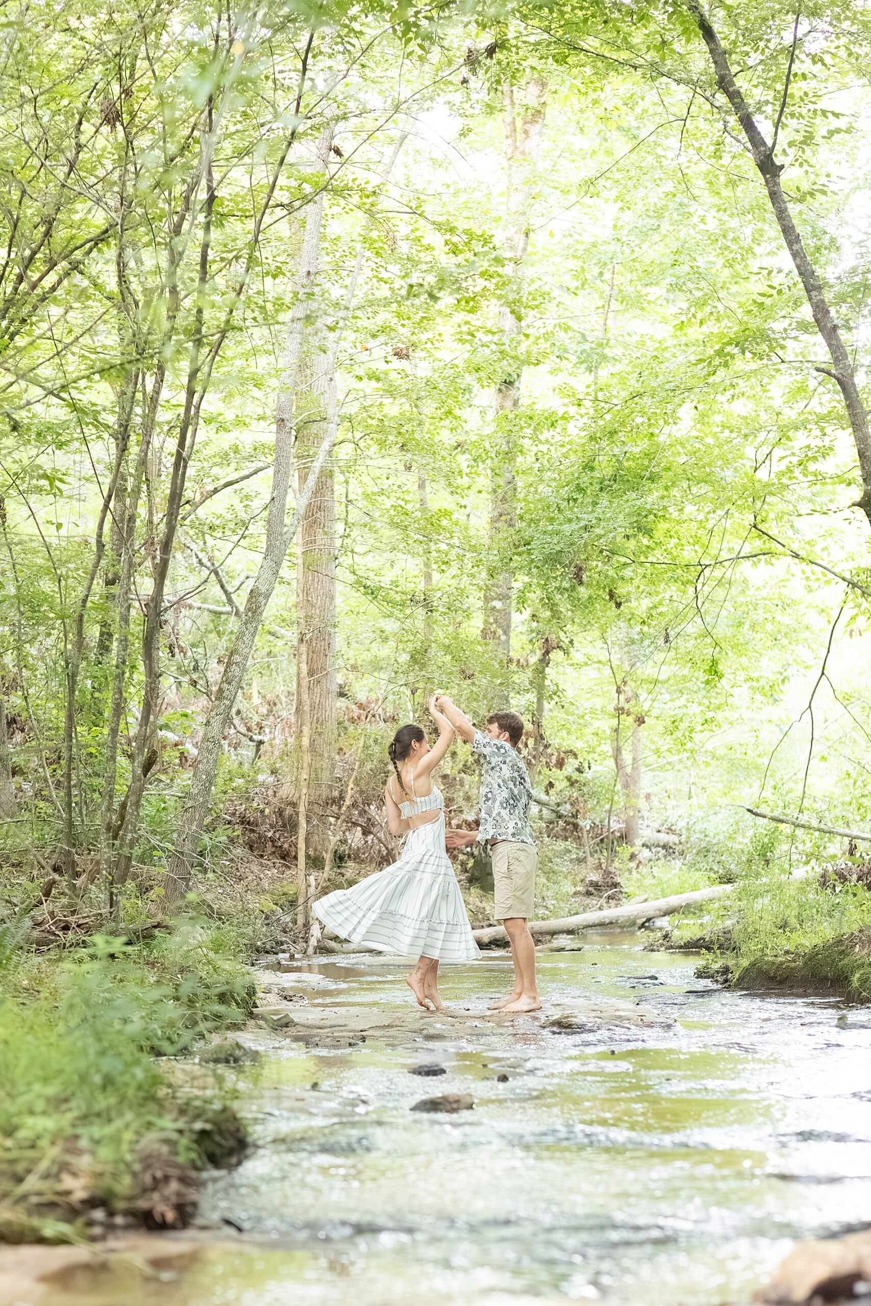 couple dance in the creek