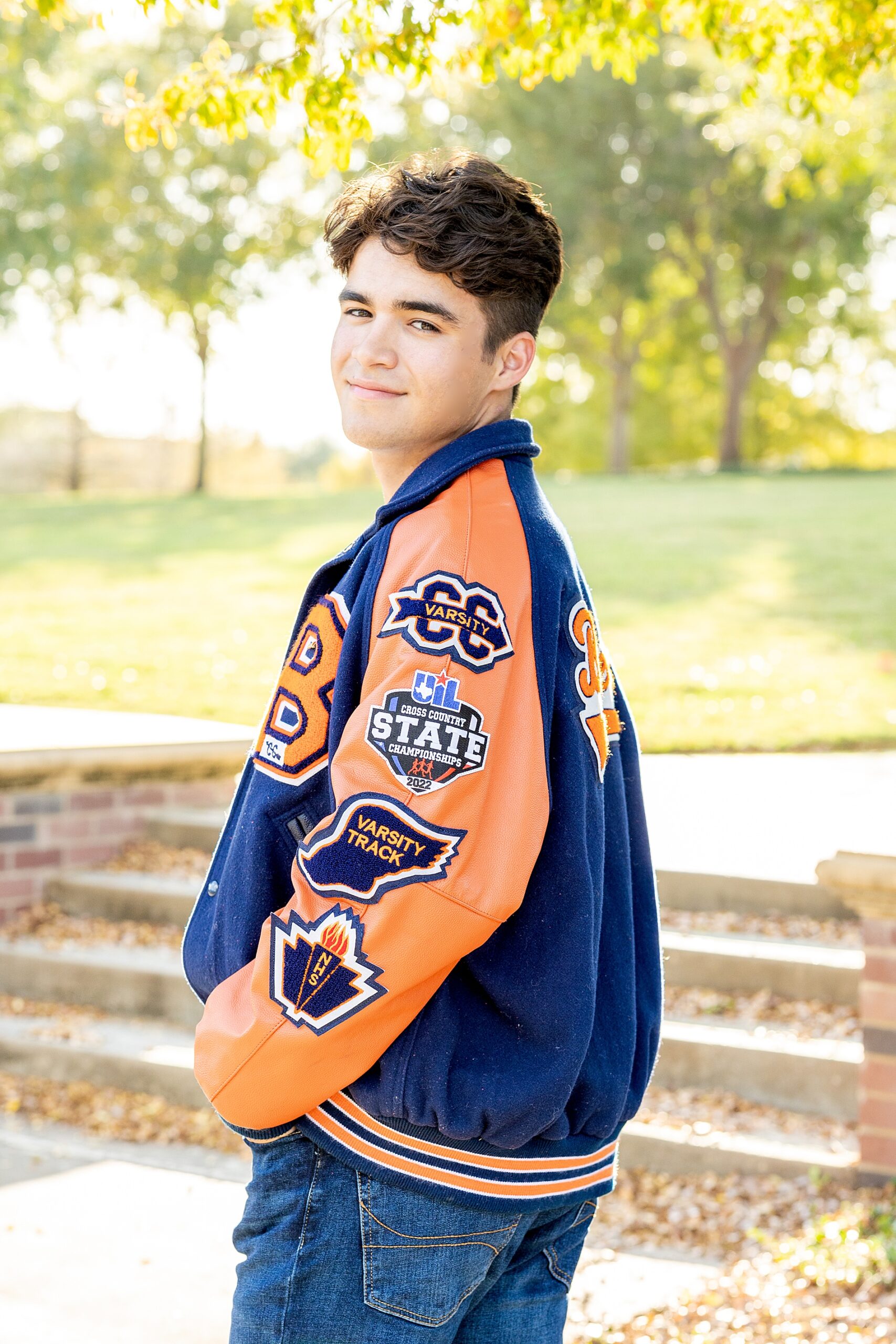 senior in letterman's jacket