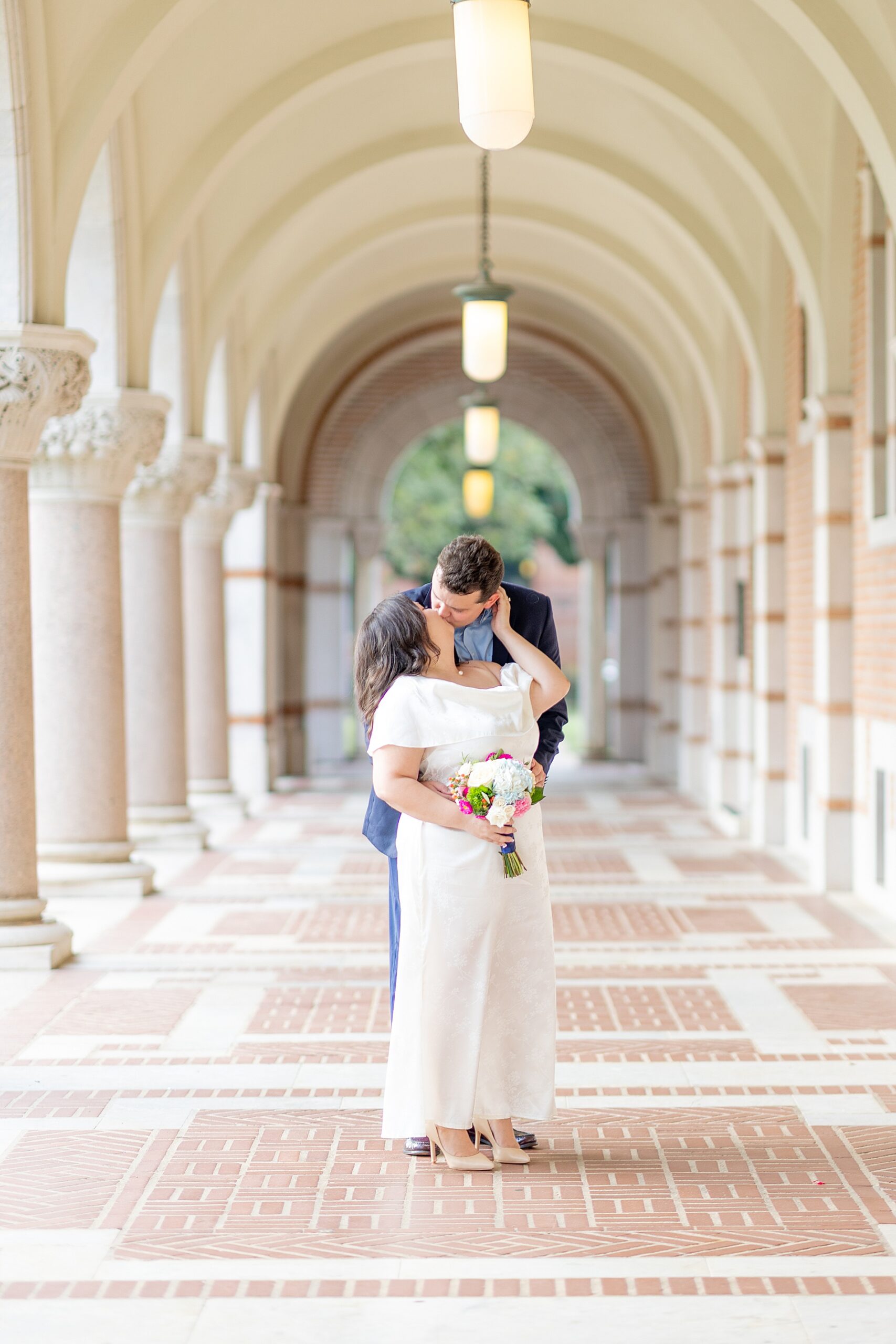 couple kiss during timeless engagement in Houston