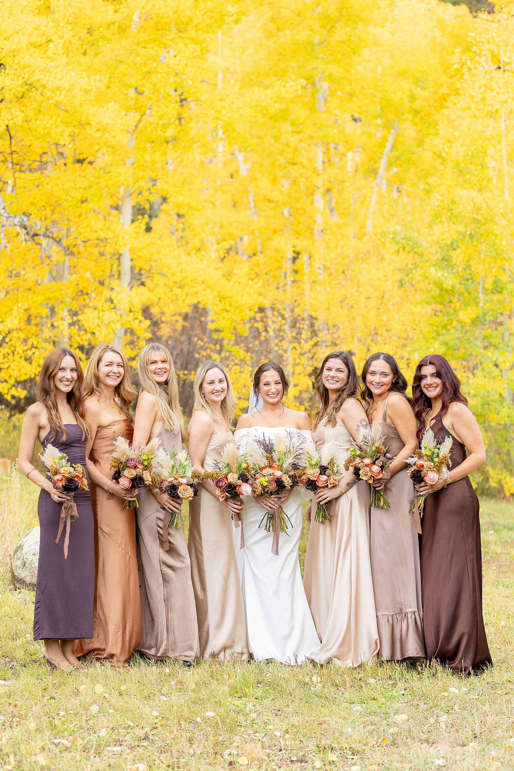 bridesmaids in neutral fall colors