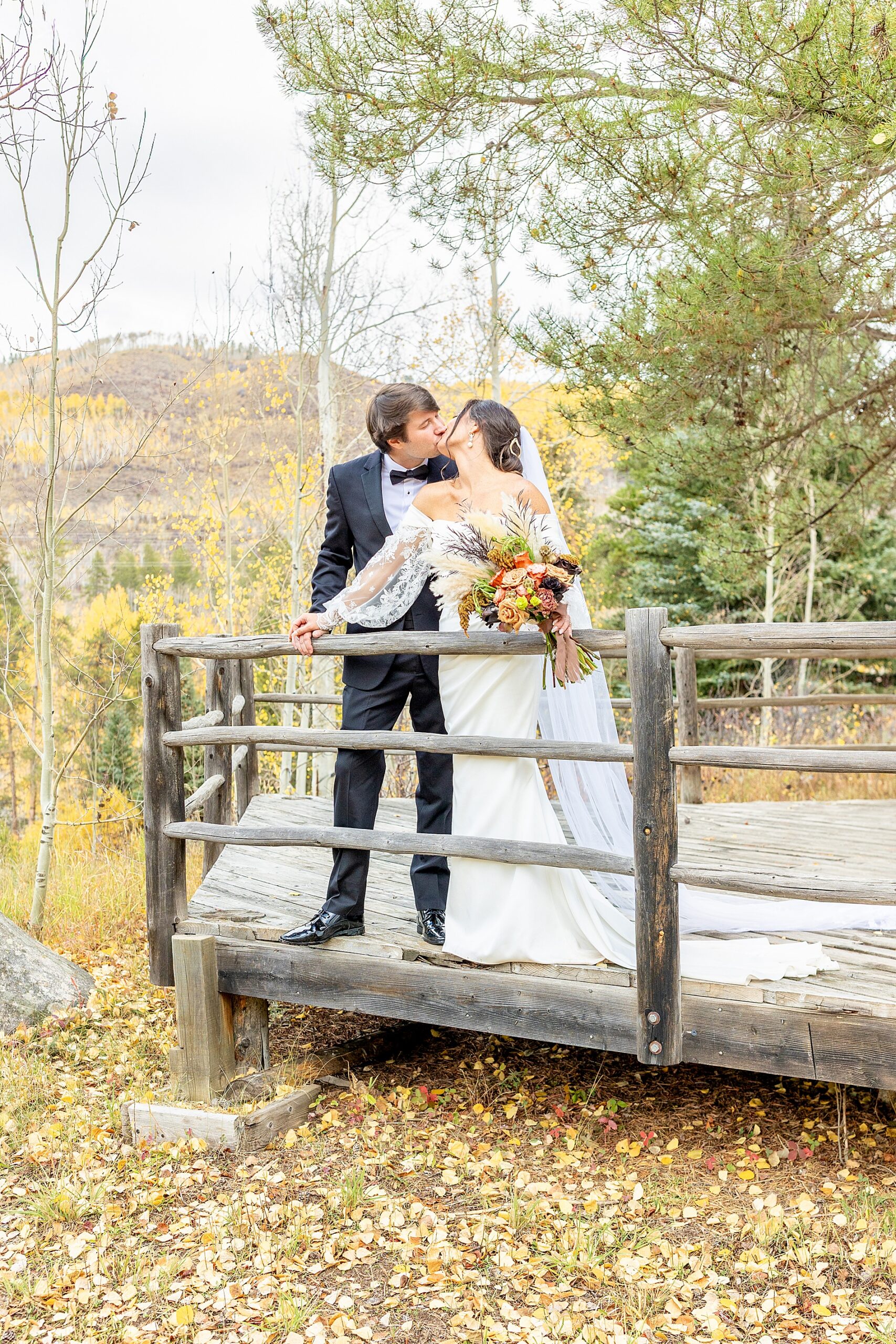 couple kiss on porch