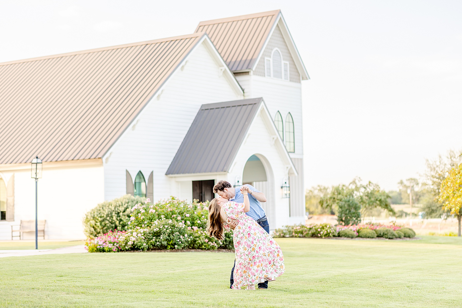 romantic Deep In The Heart Farms Engagement photos of couple kissing 