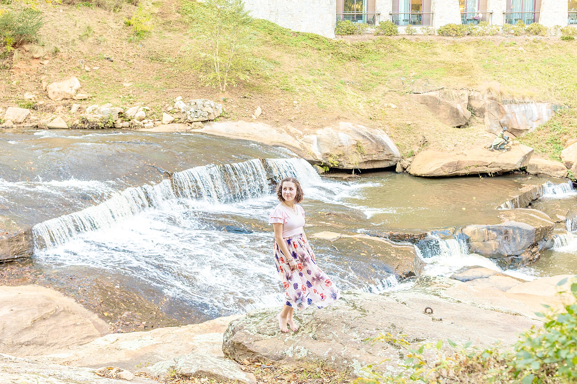 Greenville senior photographer captures senior girl at Falls Park on the reedy