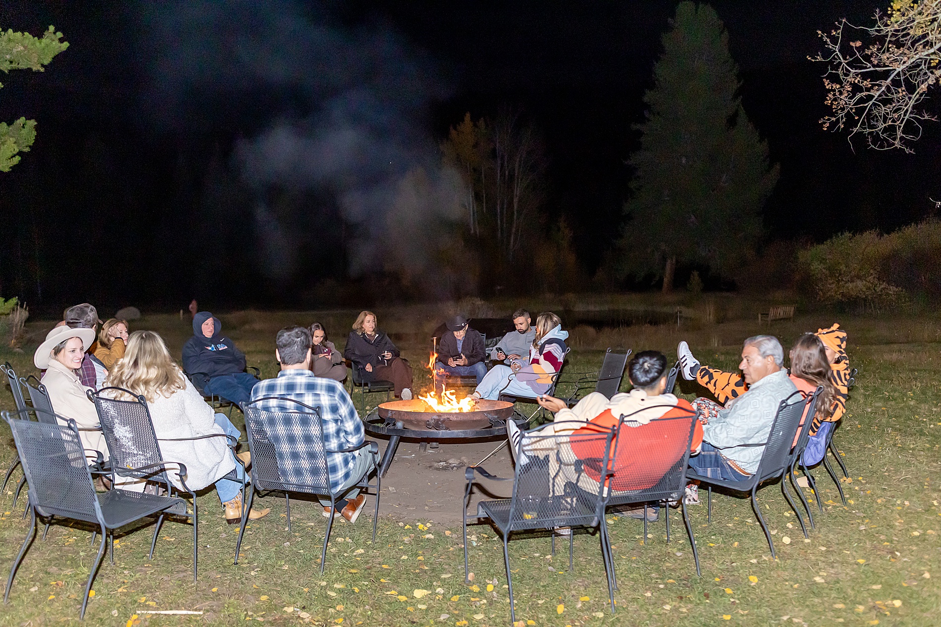 guests sitting around campfires