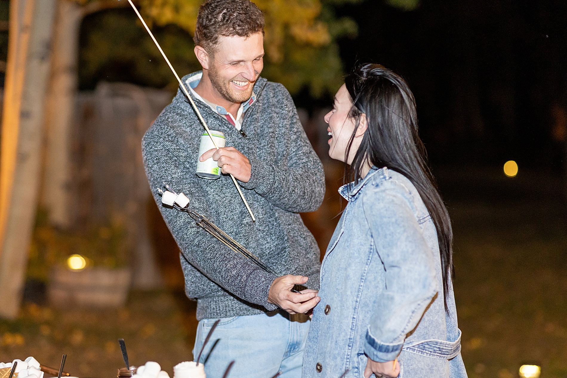 couple roasting smores