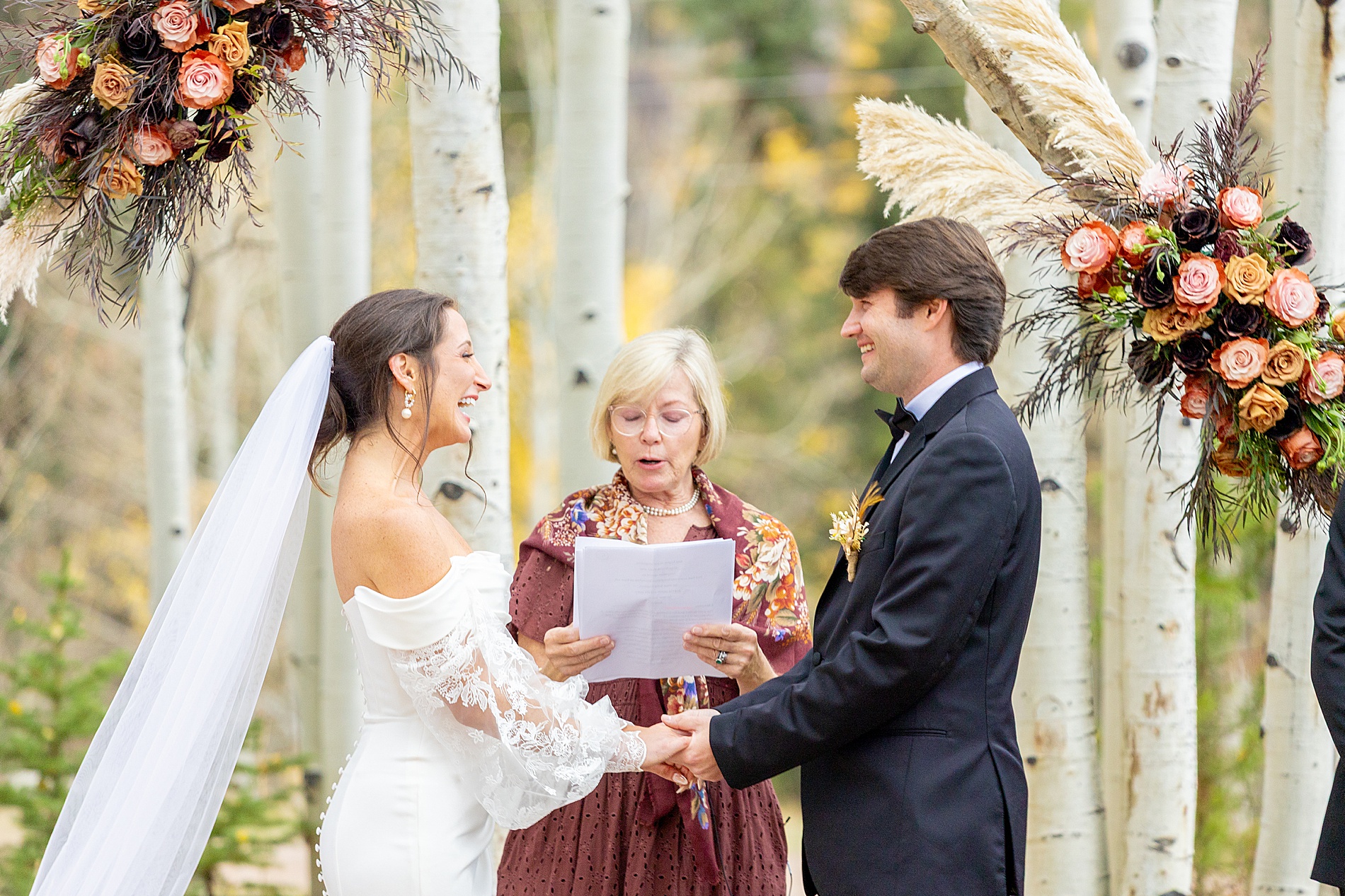 couple exchanging vows at Colorado Wedding ceremony at Beyul Retreat