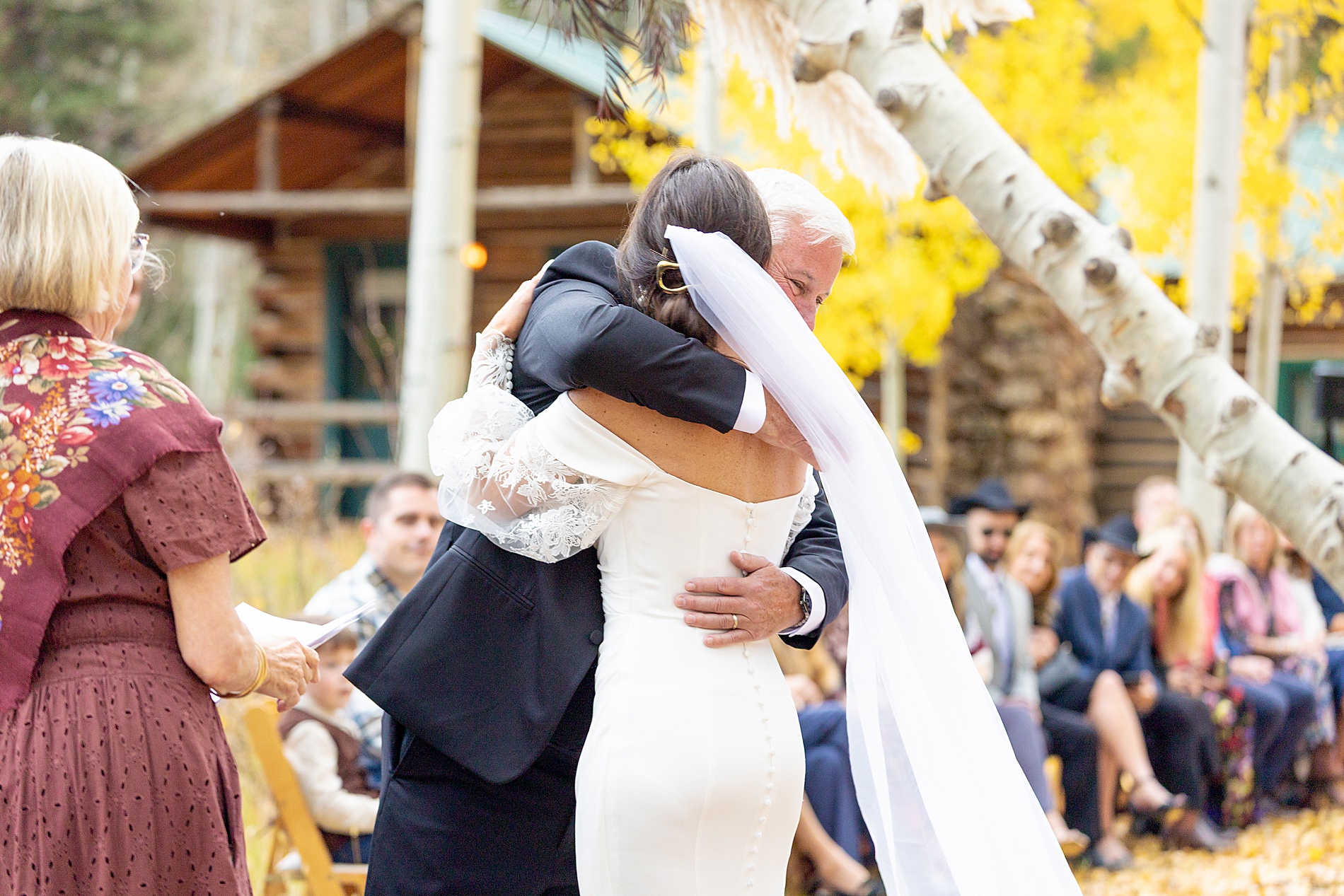 father gives daughter away at wedding ceremony