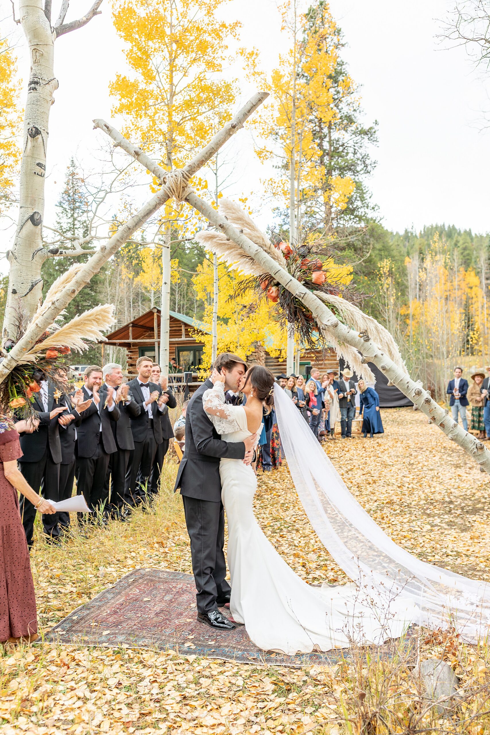 newlyweds kiss at Beyul Retreat wedding
