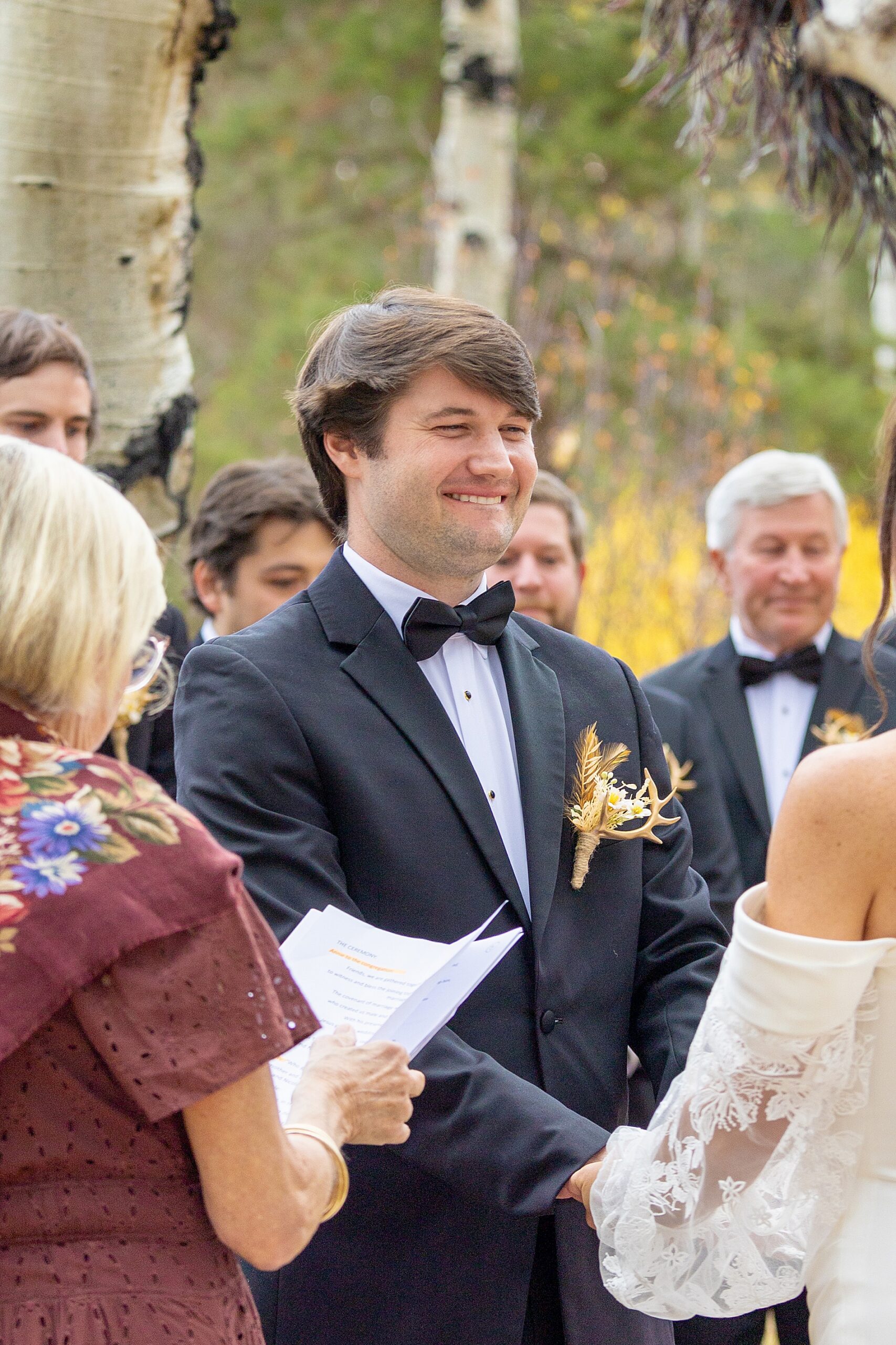 candid groom portraits during wedding