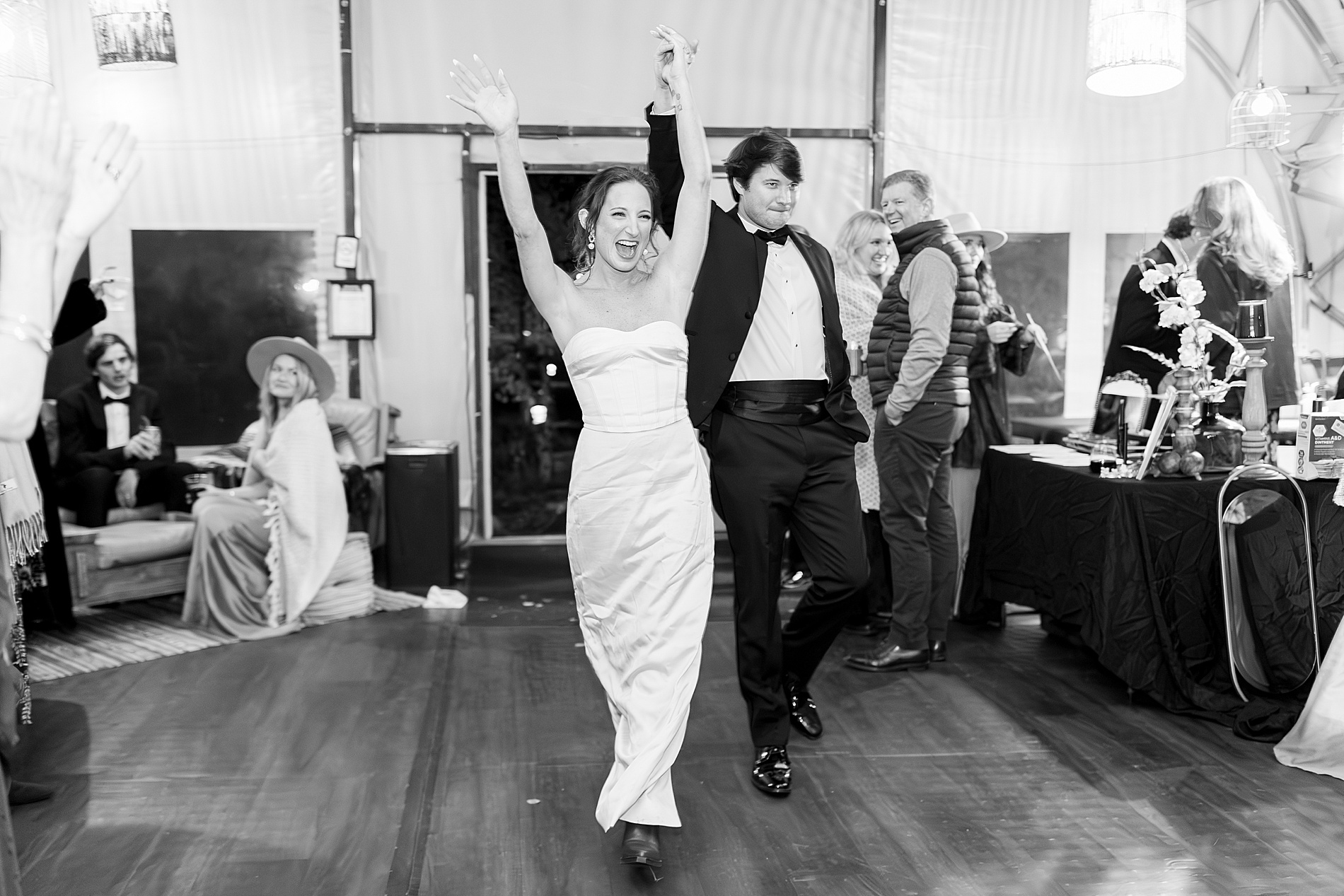 newlyweds enter wedding reception