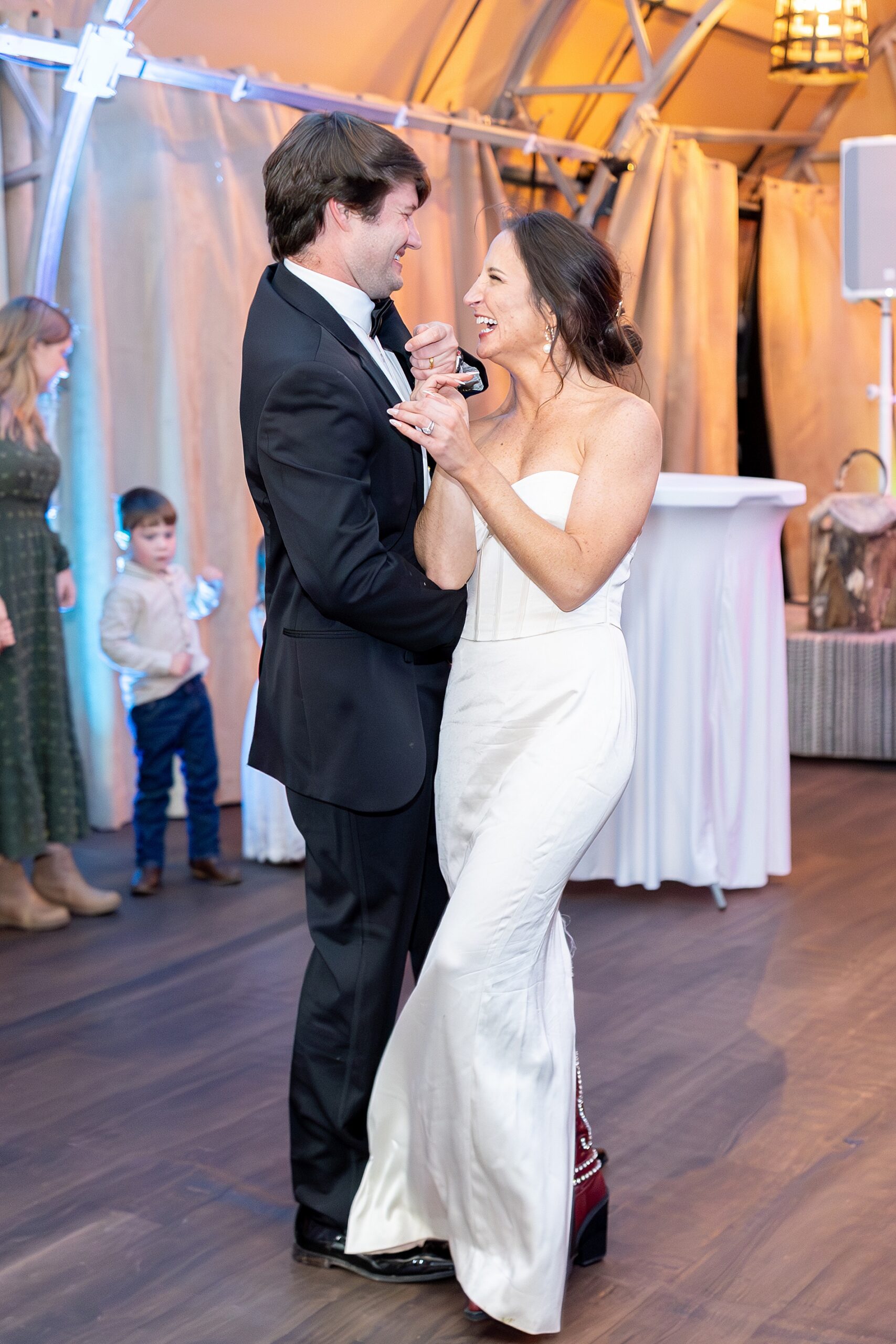 candid dance floor portraits at wedding reception in Aspen, CO