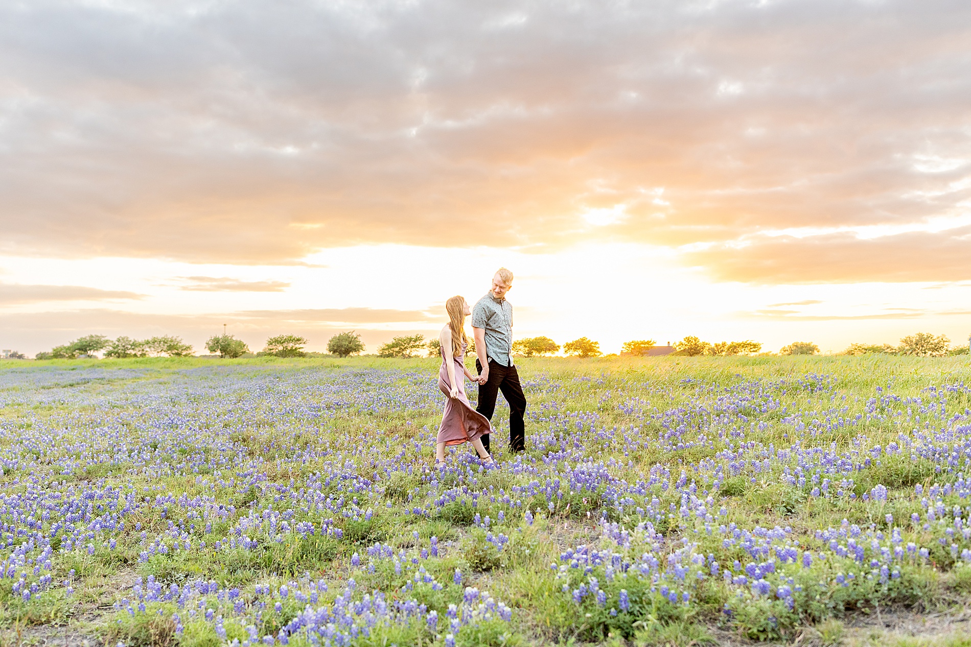 Sunset Texas bluebonnet engagement session in Brenham, TX