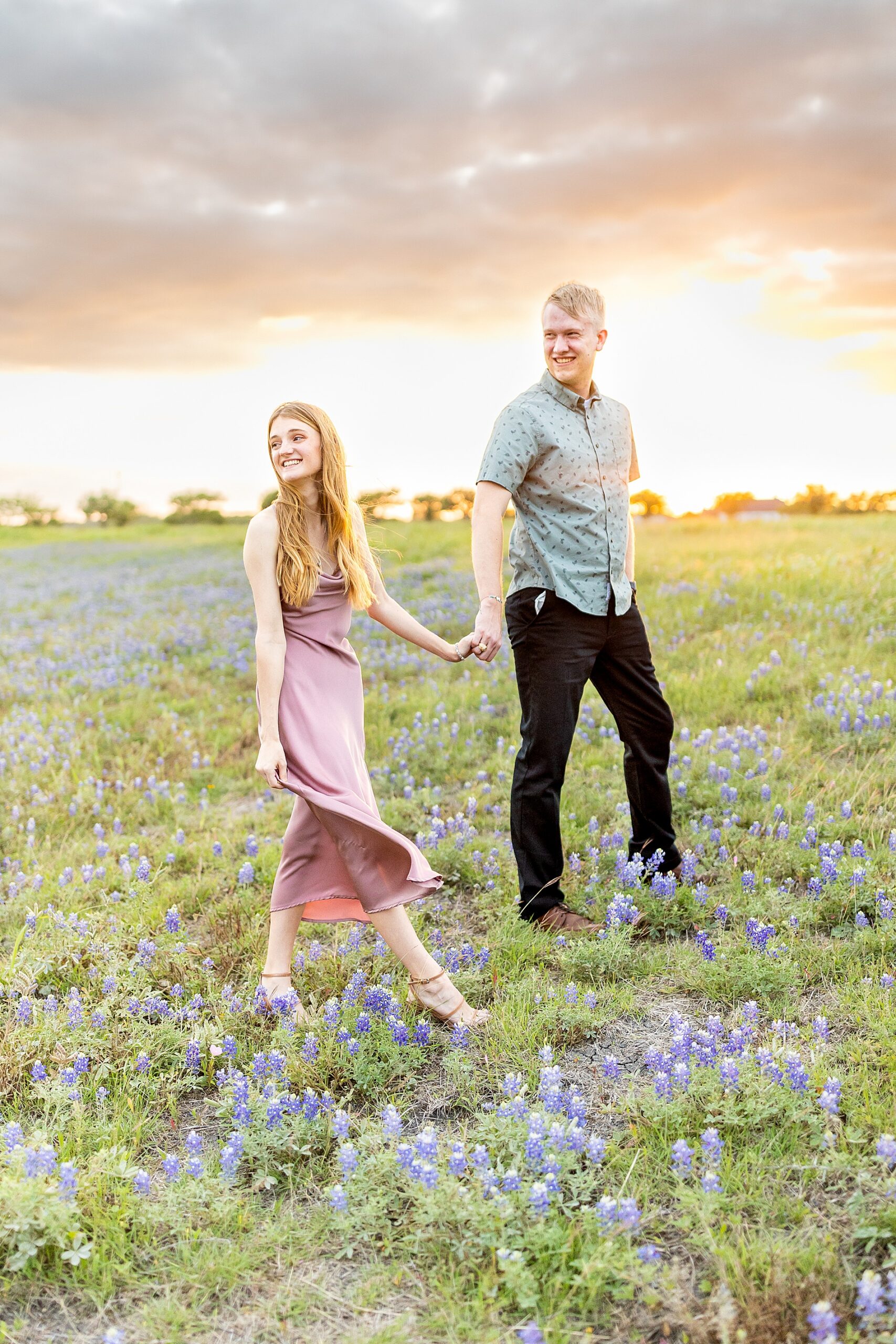 sunset engagement session in bluebonnet field in Texas