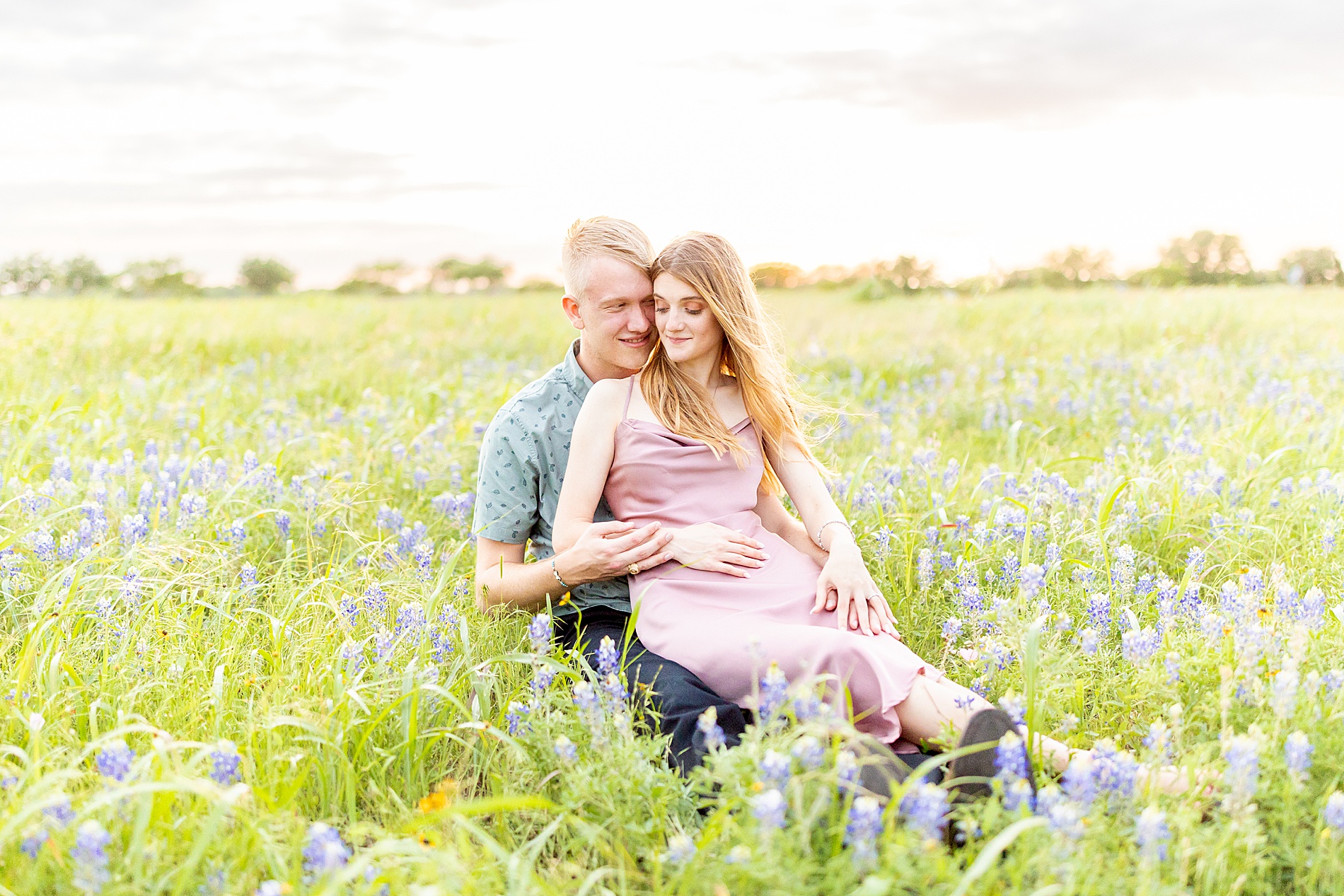 romantic engagement session in Brenham, TX during peak bluebonnet season