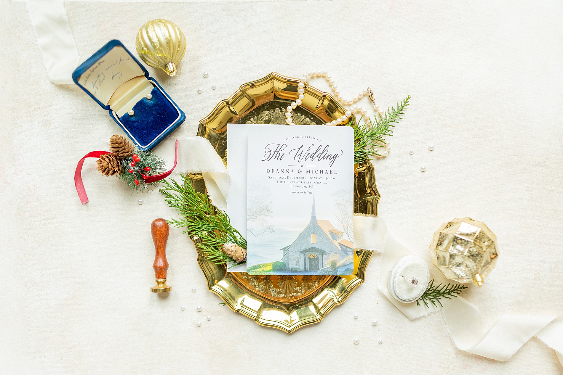 wedding invitation with picture of The Cliffs at Glassy on invite