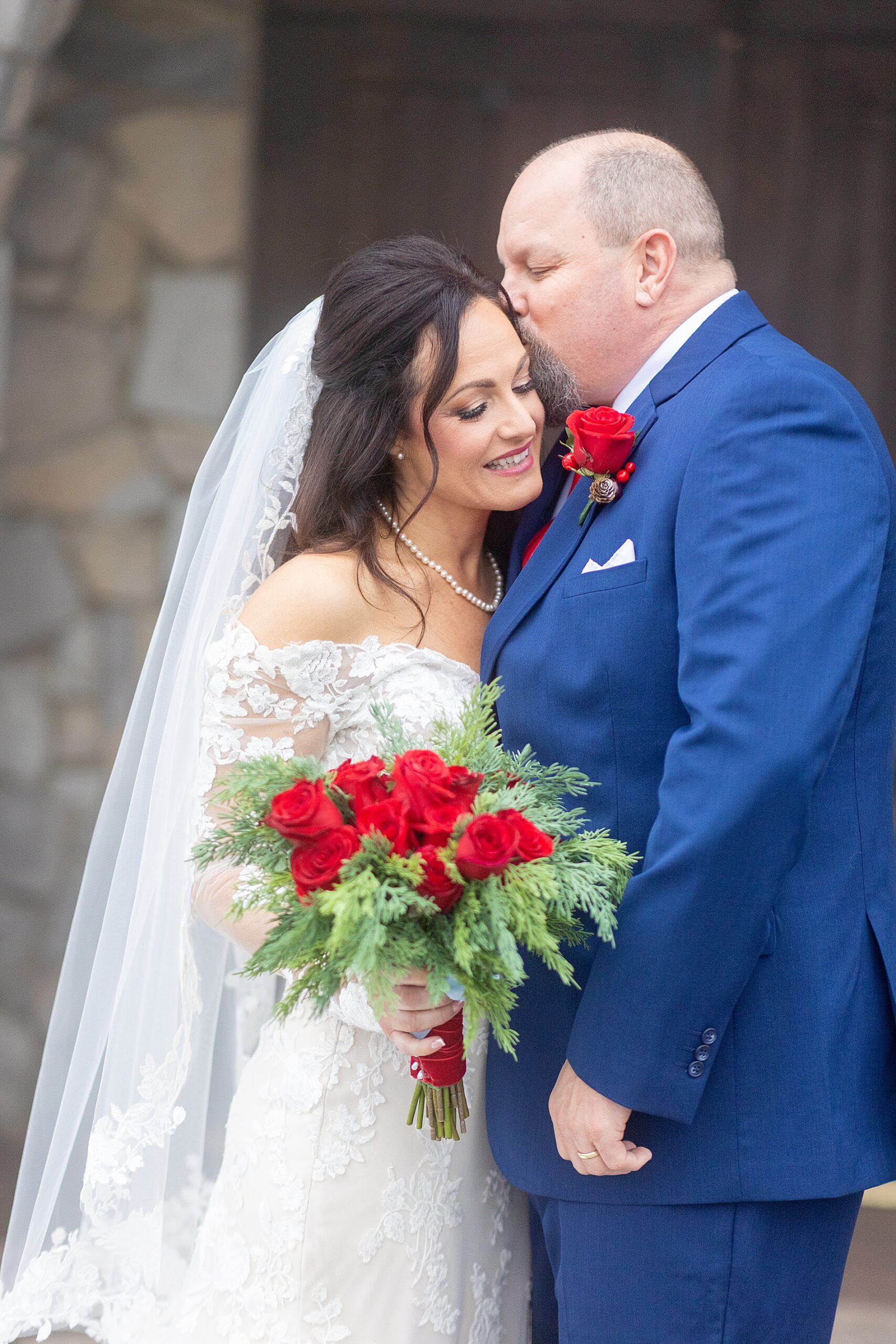 groom kisses bride