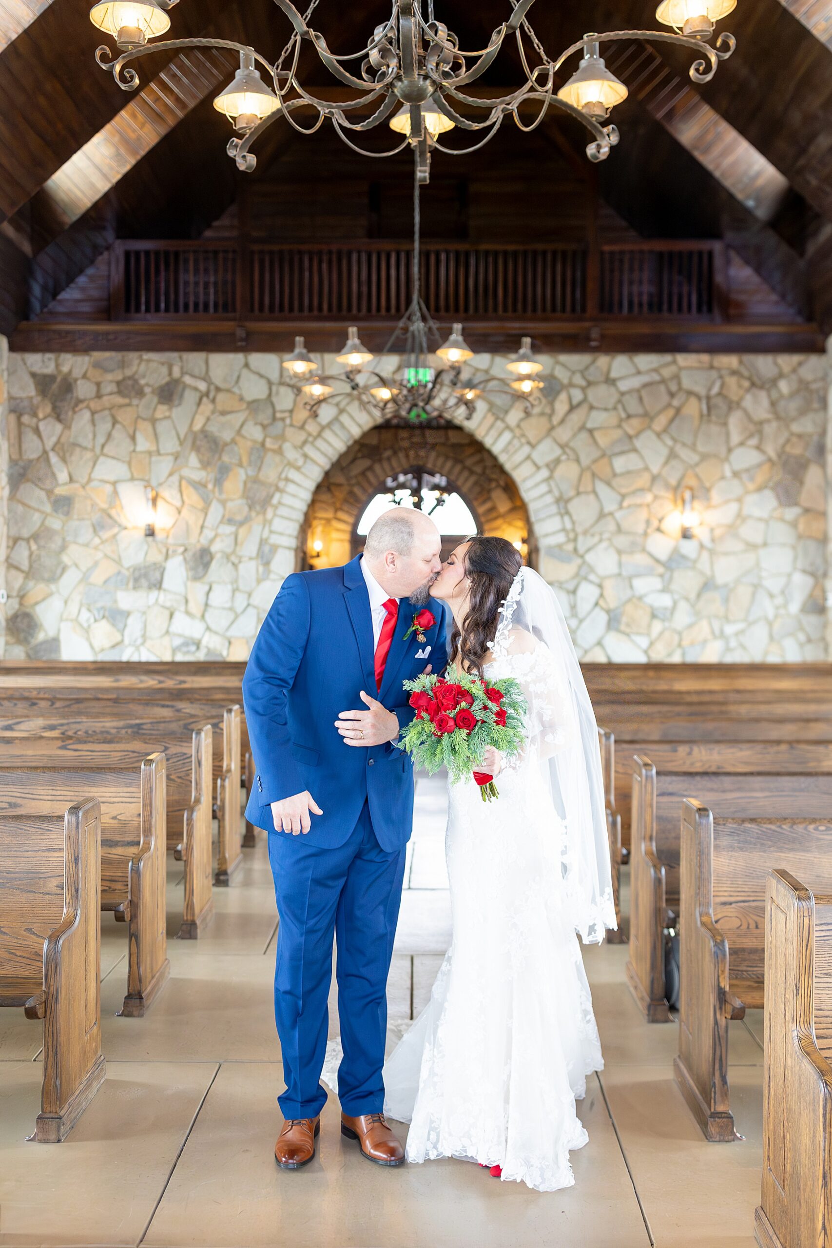 newlyweds kiss inside chapel 