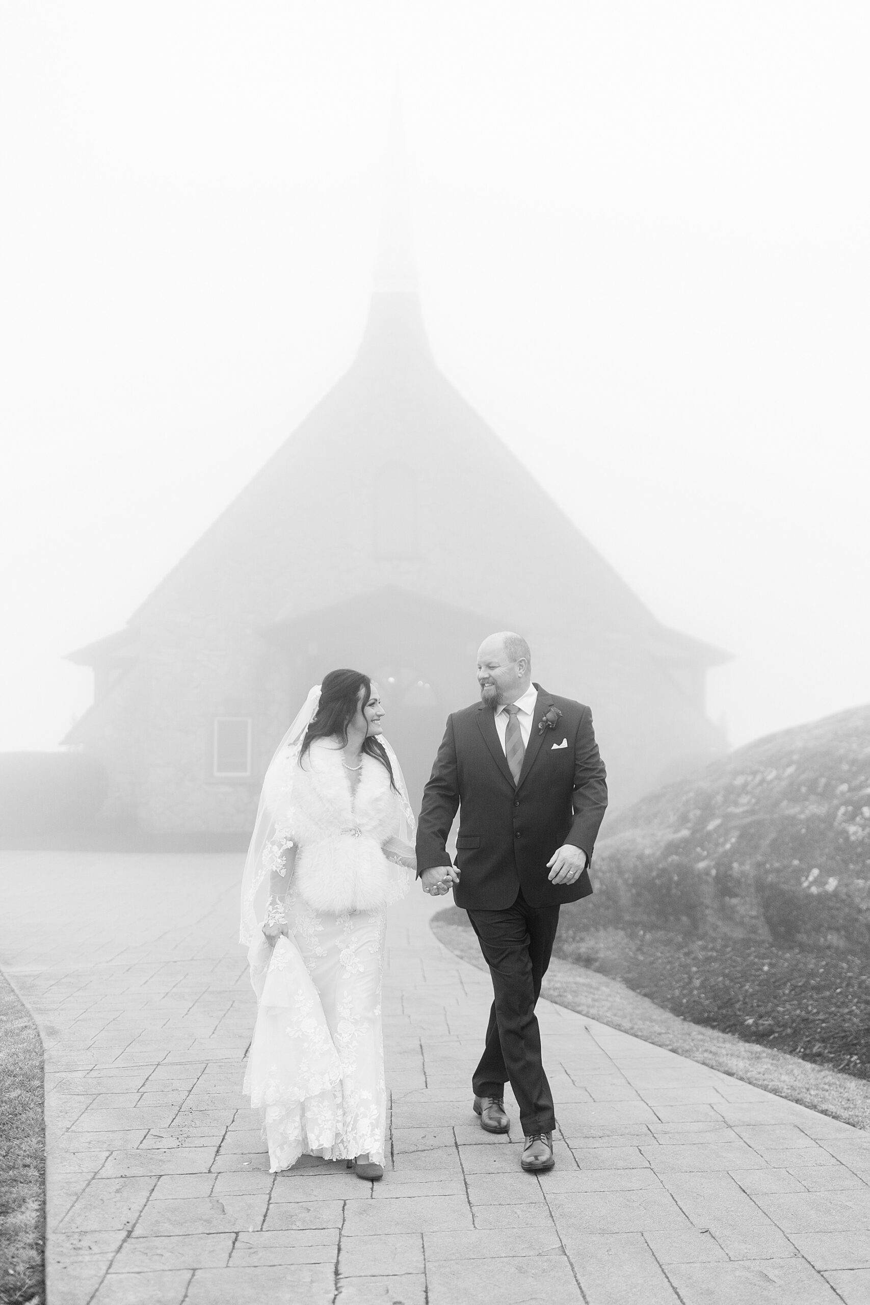 winter wedding portraits on foggy morning 